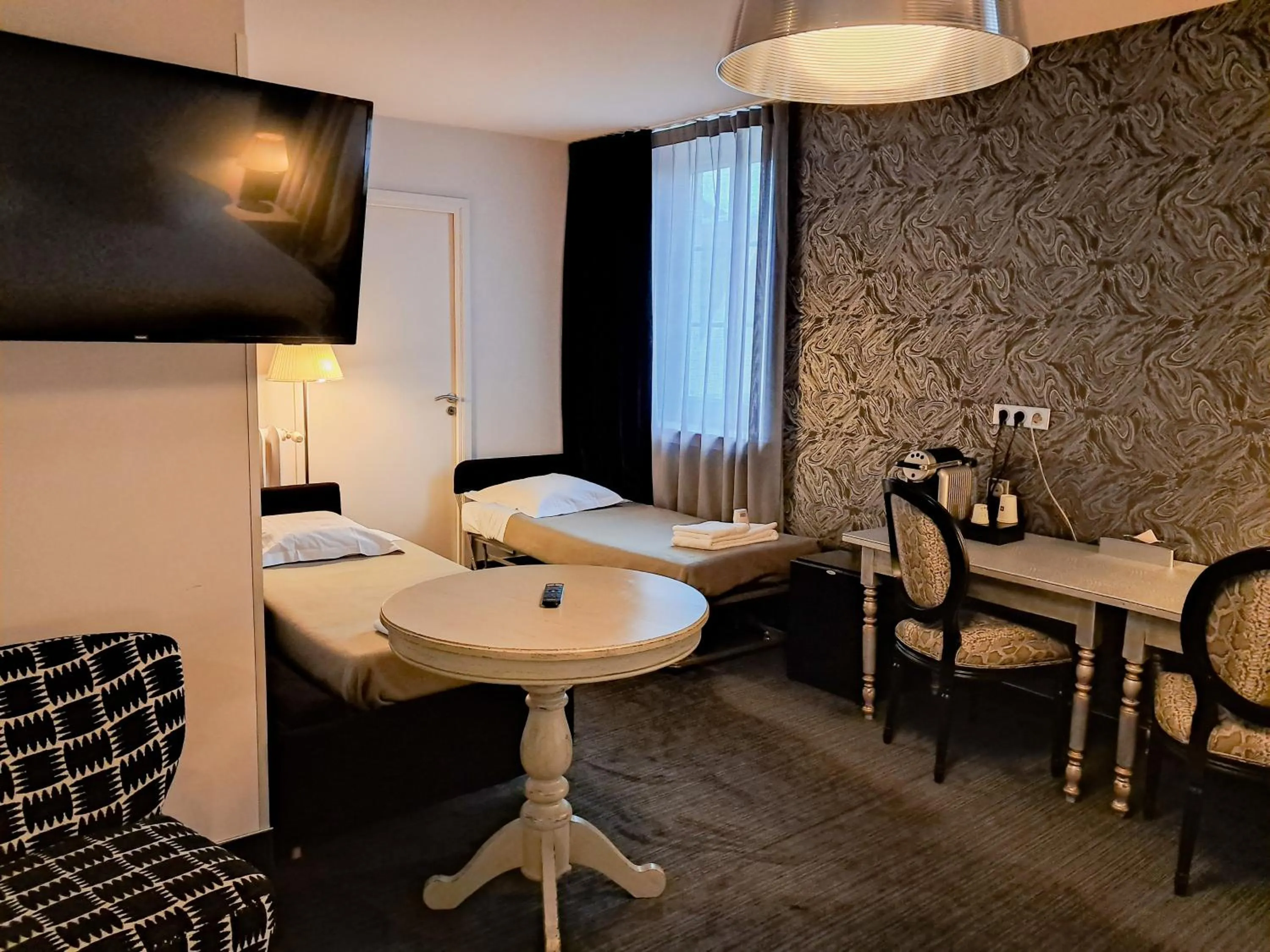 Bedroom in Hôtel de Paris