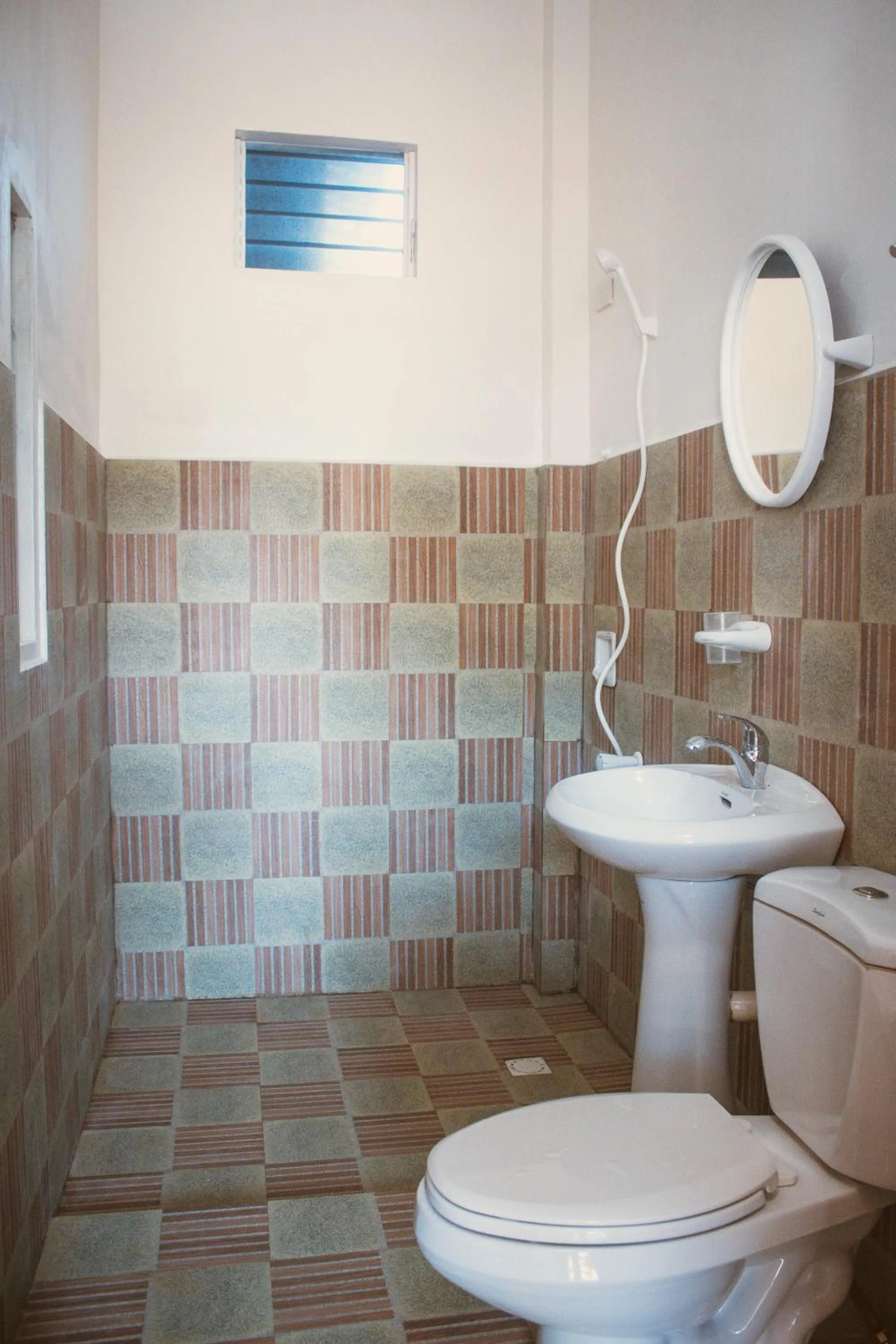 Toilet in Oceanfront Beach Resort