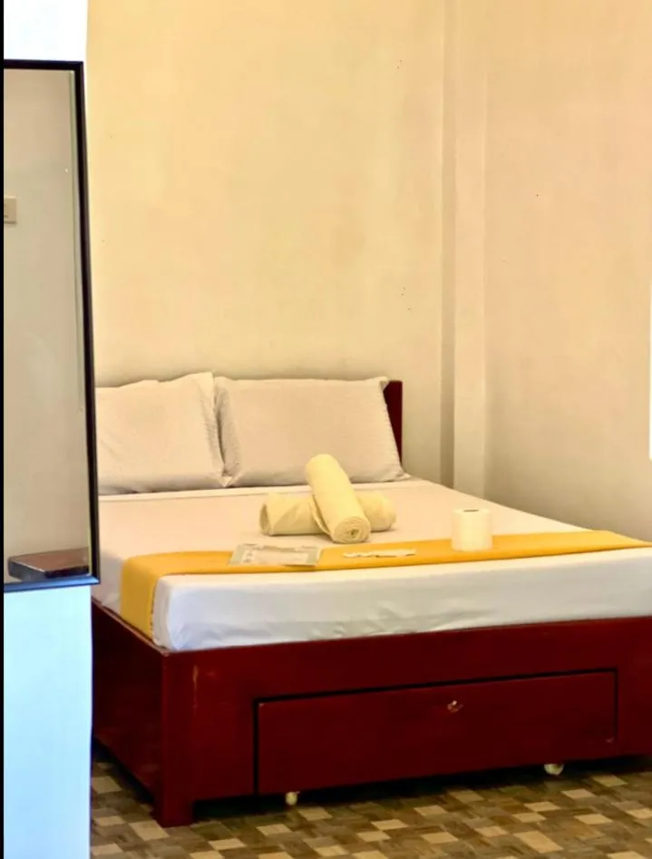 Bed in Oceanfront Beach Resort