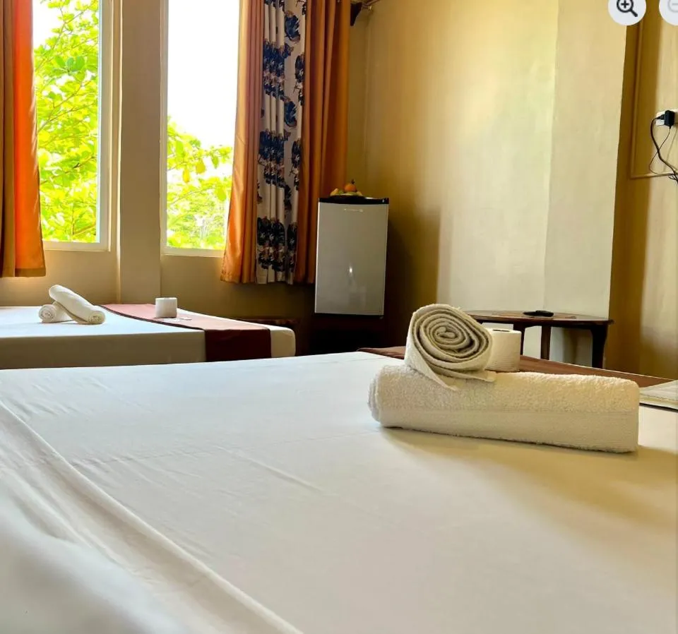 Bed in Oceanfront Beach Resort