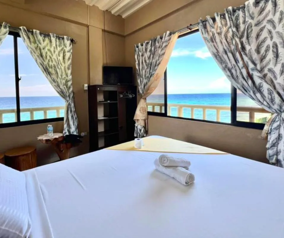 Bed in Oceanfront Beach Resort