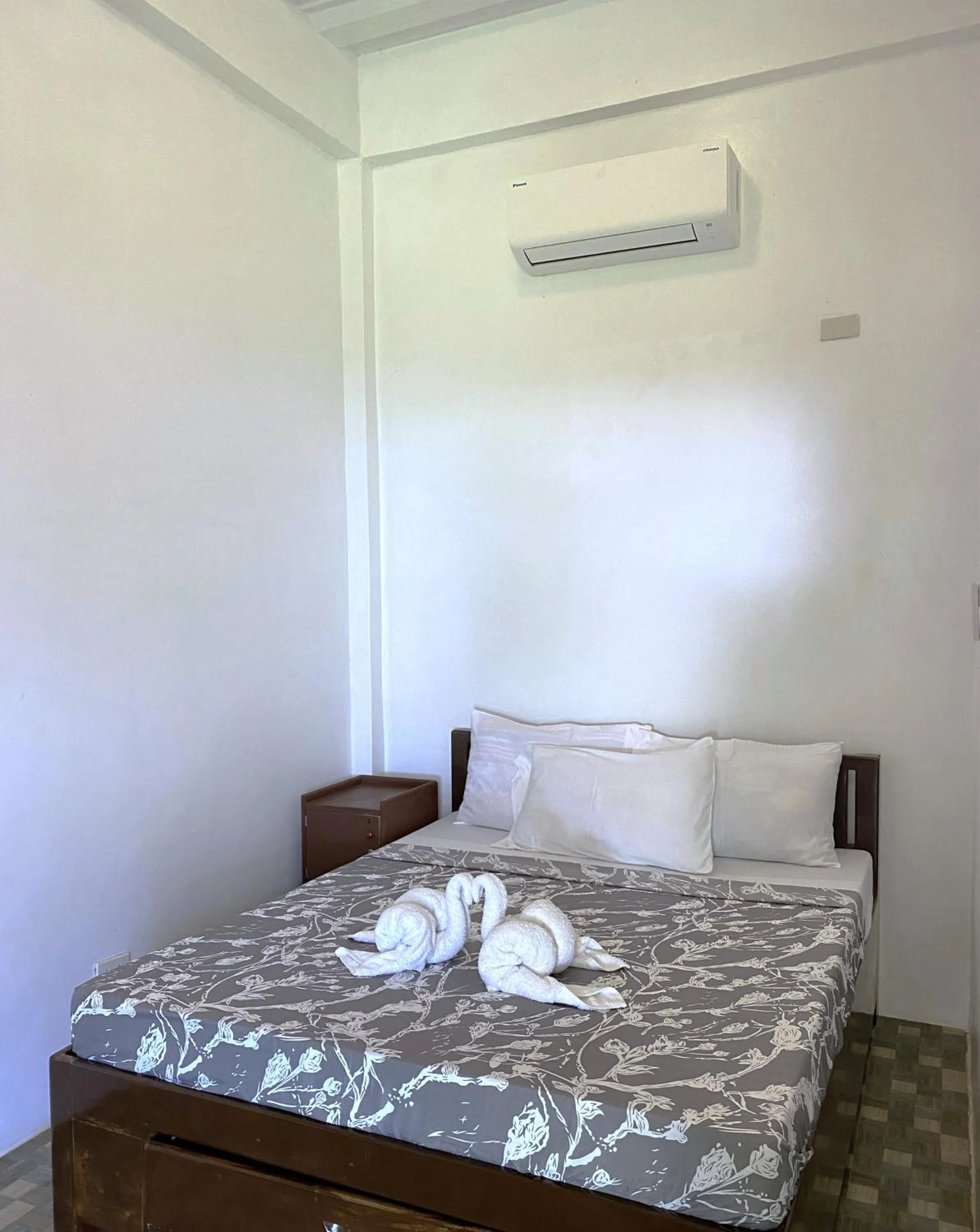 Bed in Oceanfront Beach Resort