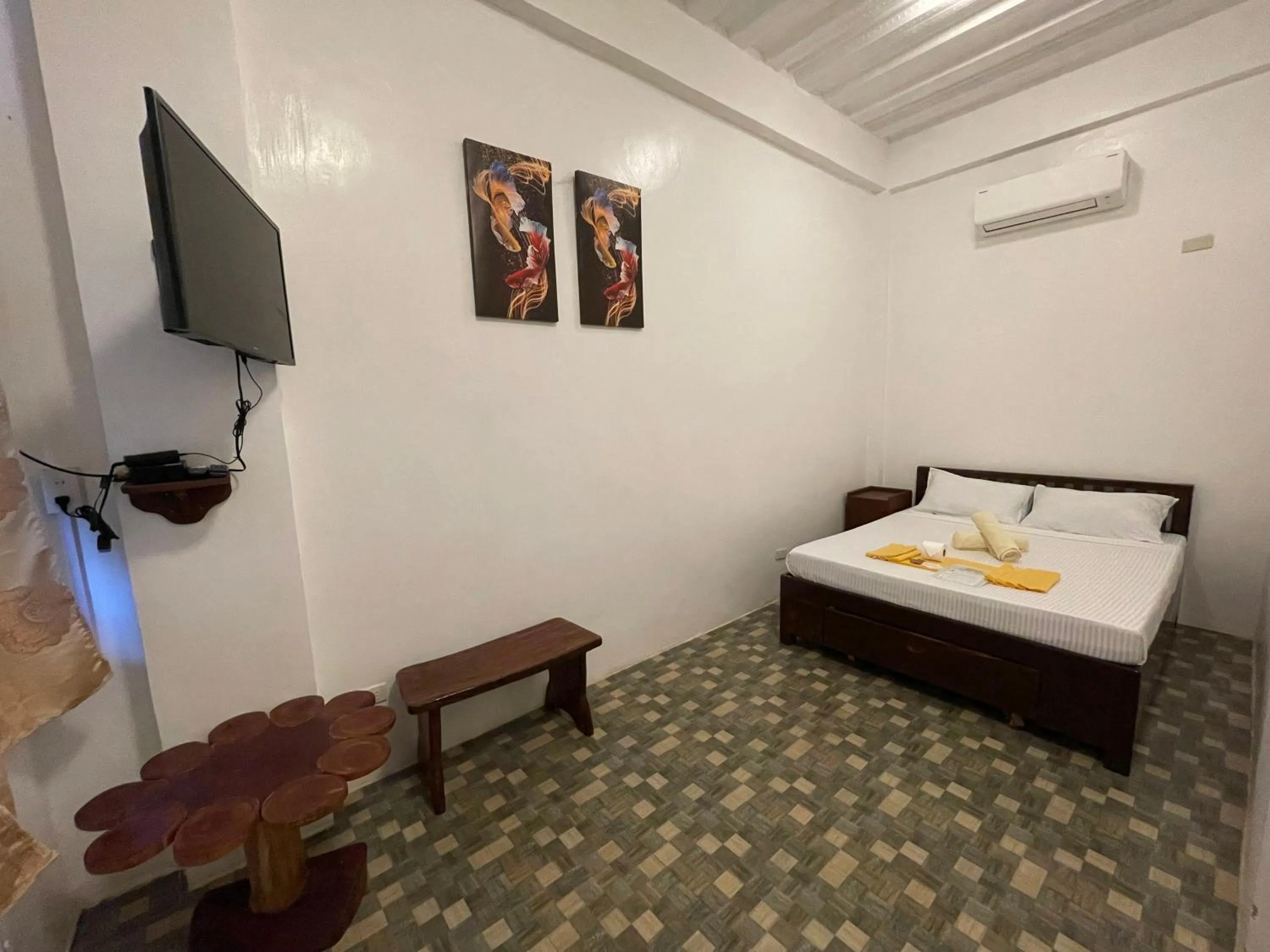 Bed in Oceanfront Beach Resort