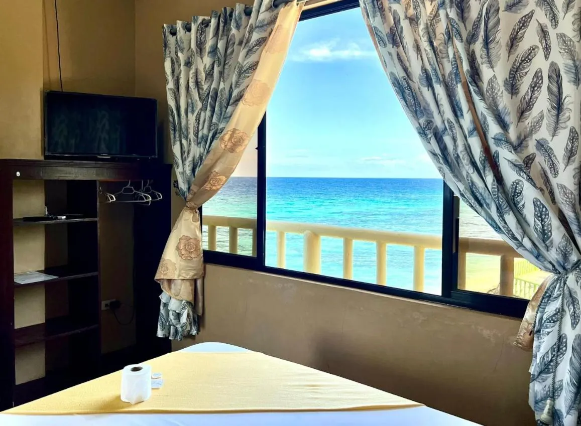 Bed in Oceanfront Beach Resort