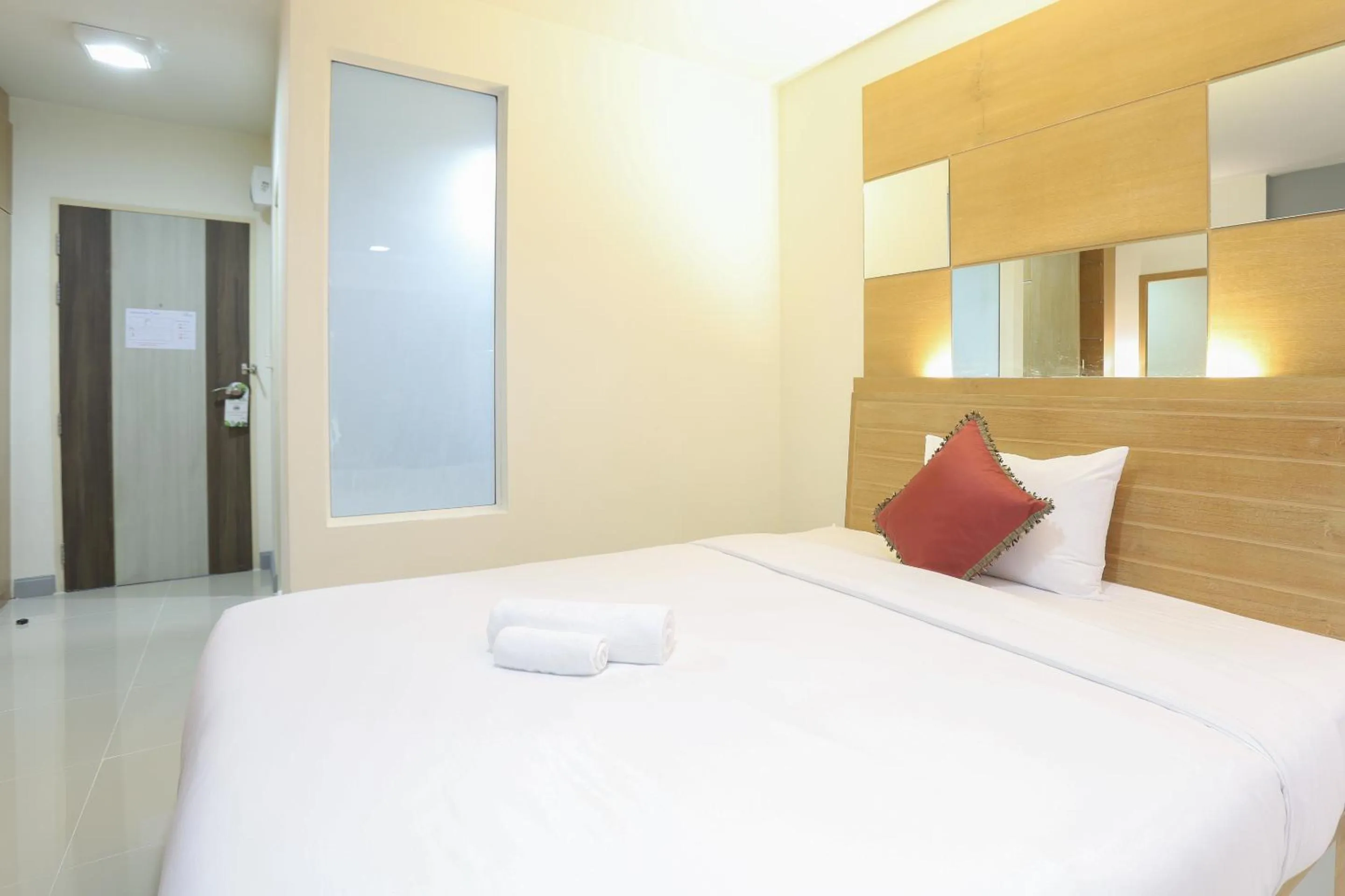 Bed in The Greenery central suite & hotel