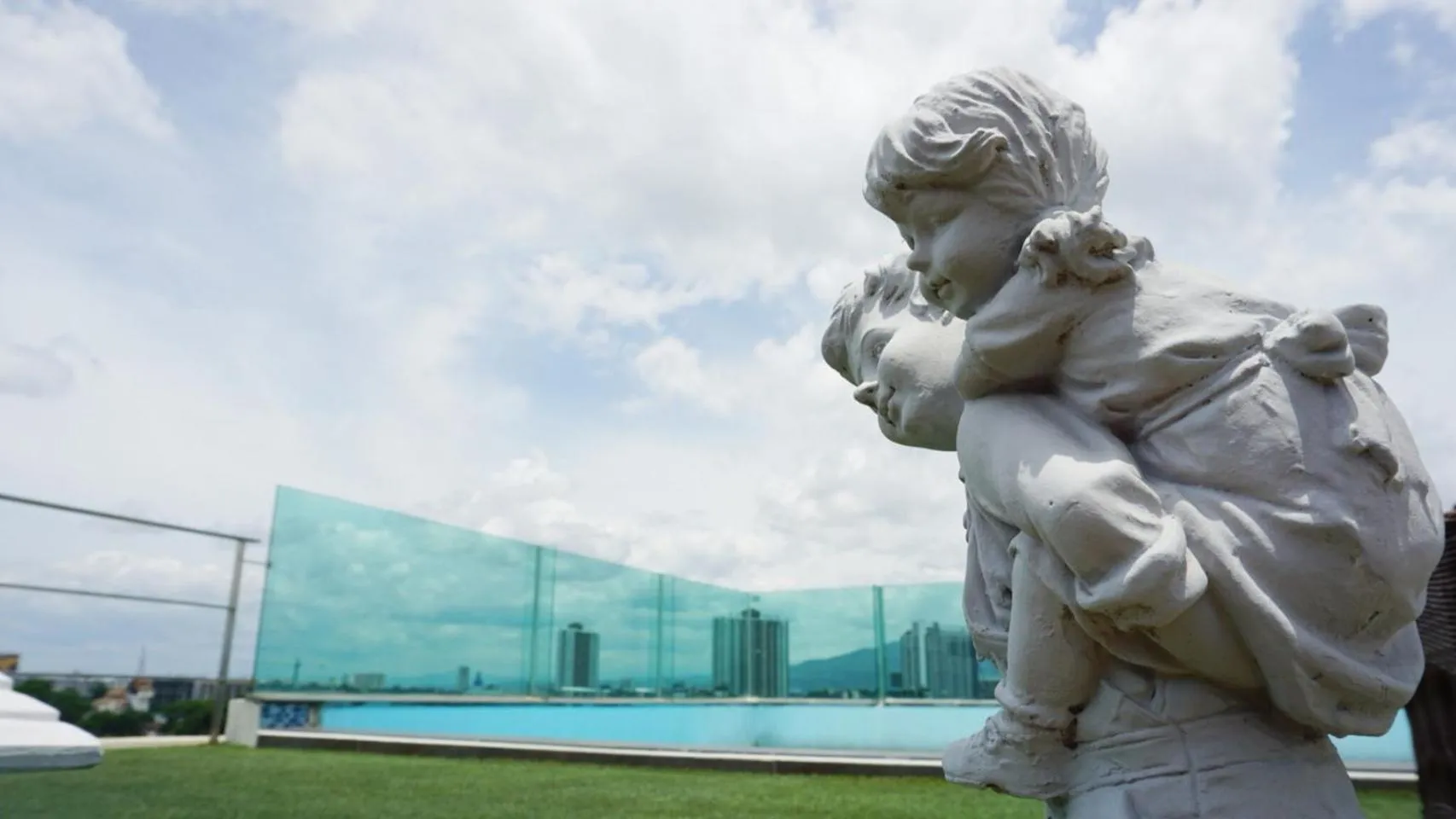 Swimming pool in The Greenery central suite & hotel