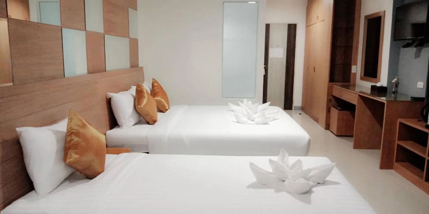 Bed in The Greenery central suite & hotel