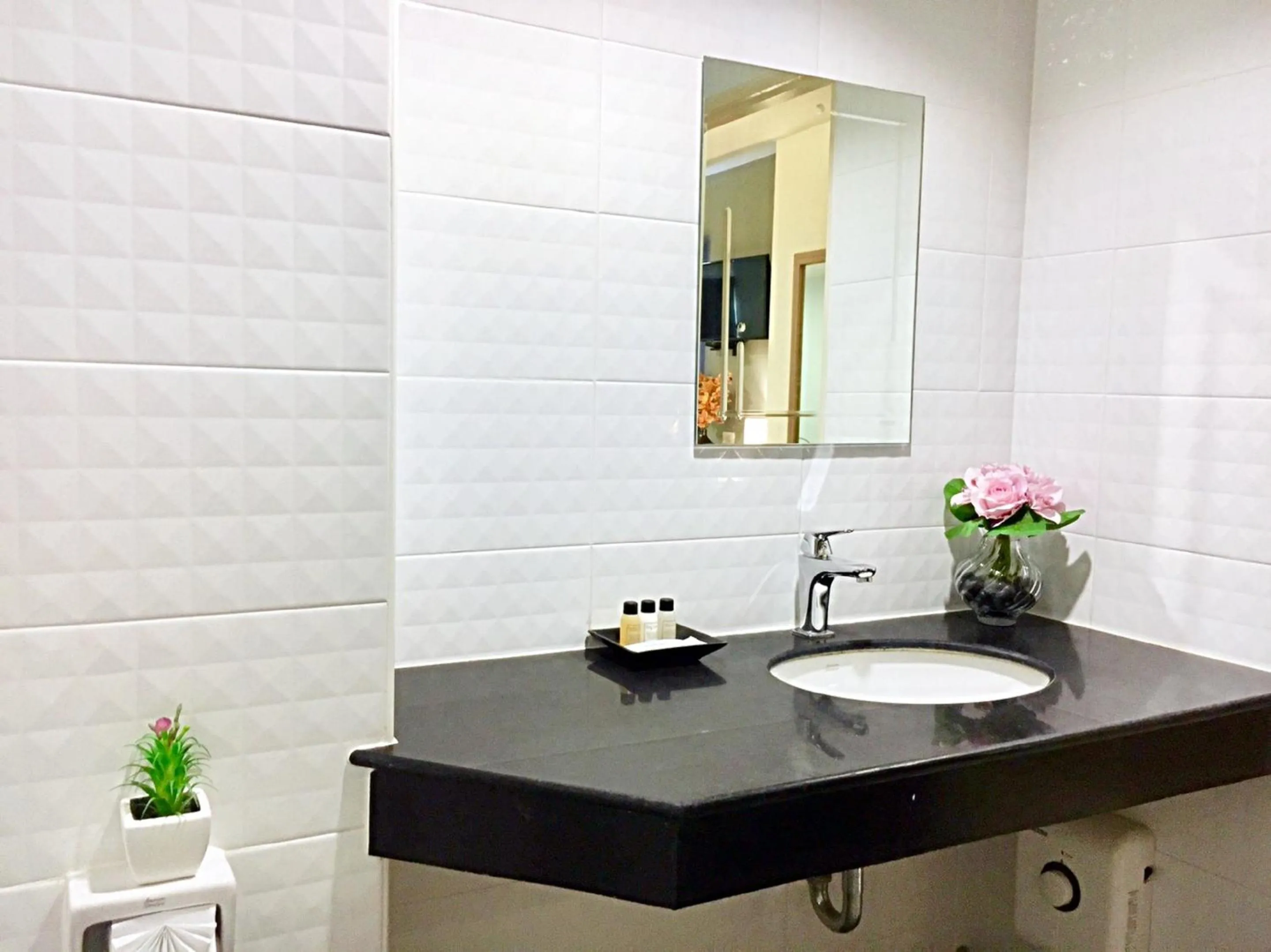 Toilet in The Greenery central suite & hotel