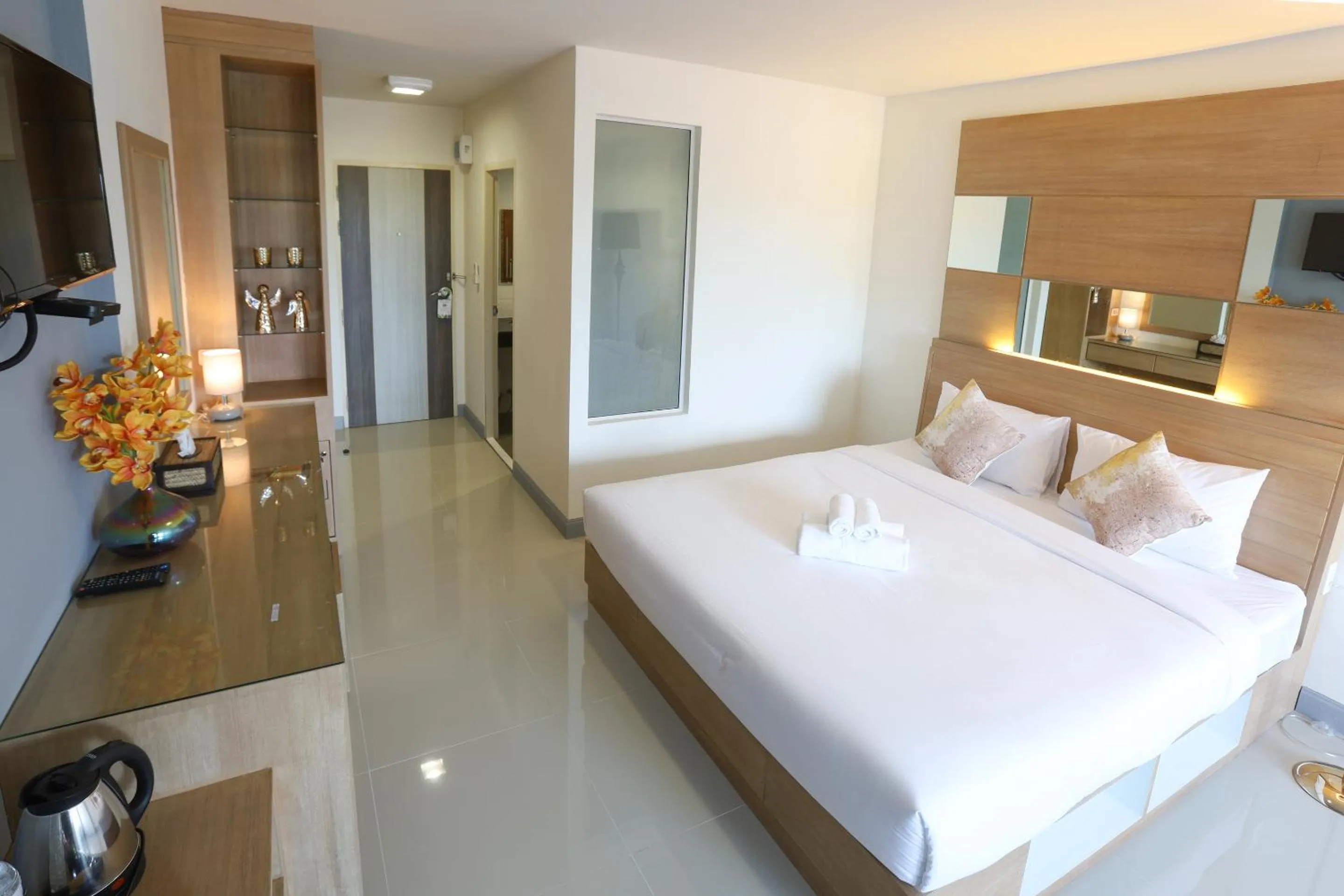 Photo of the whole room, Bed in The Greenery central suite & hotel