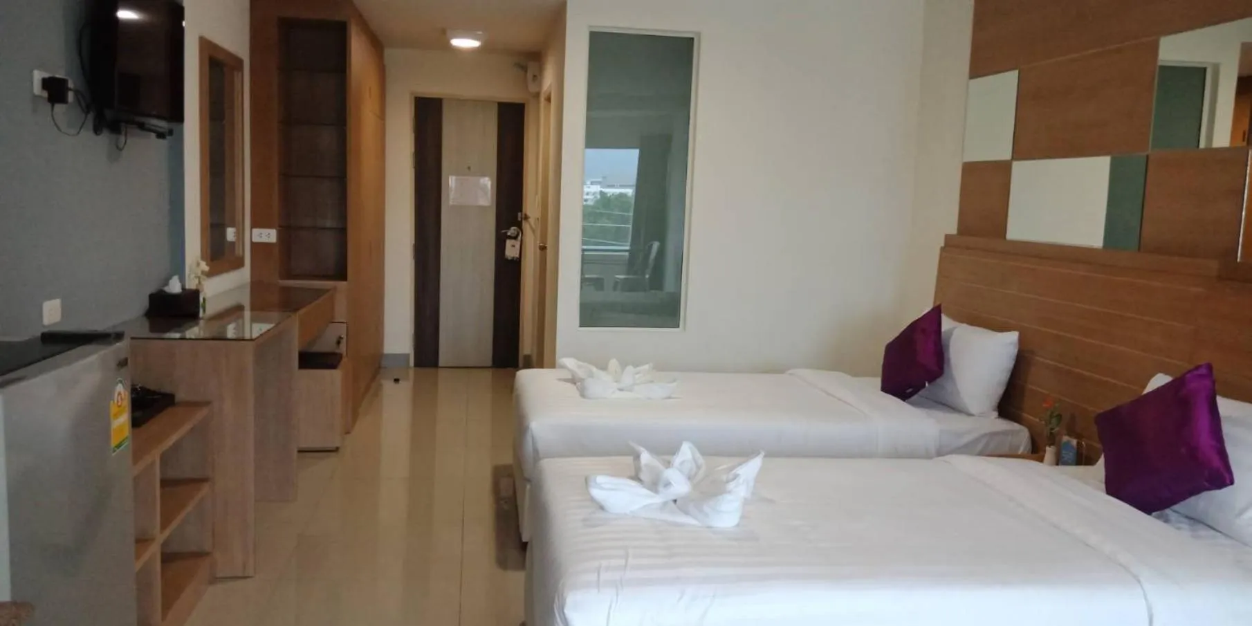 Bed in The Greenery central suite & hotel