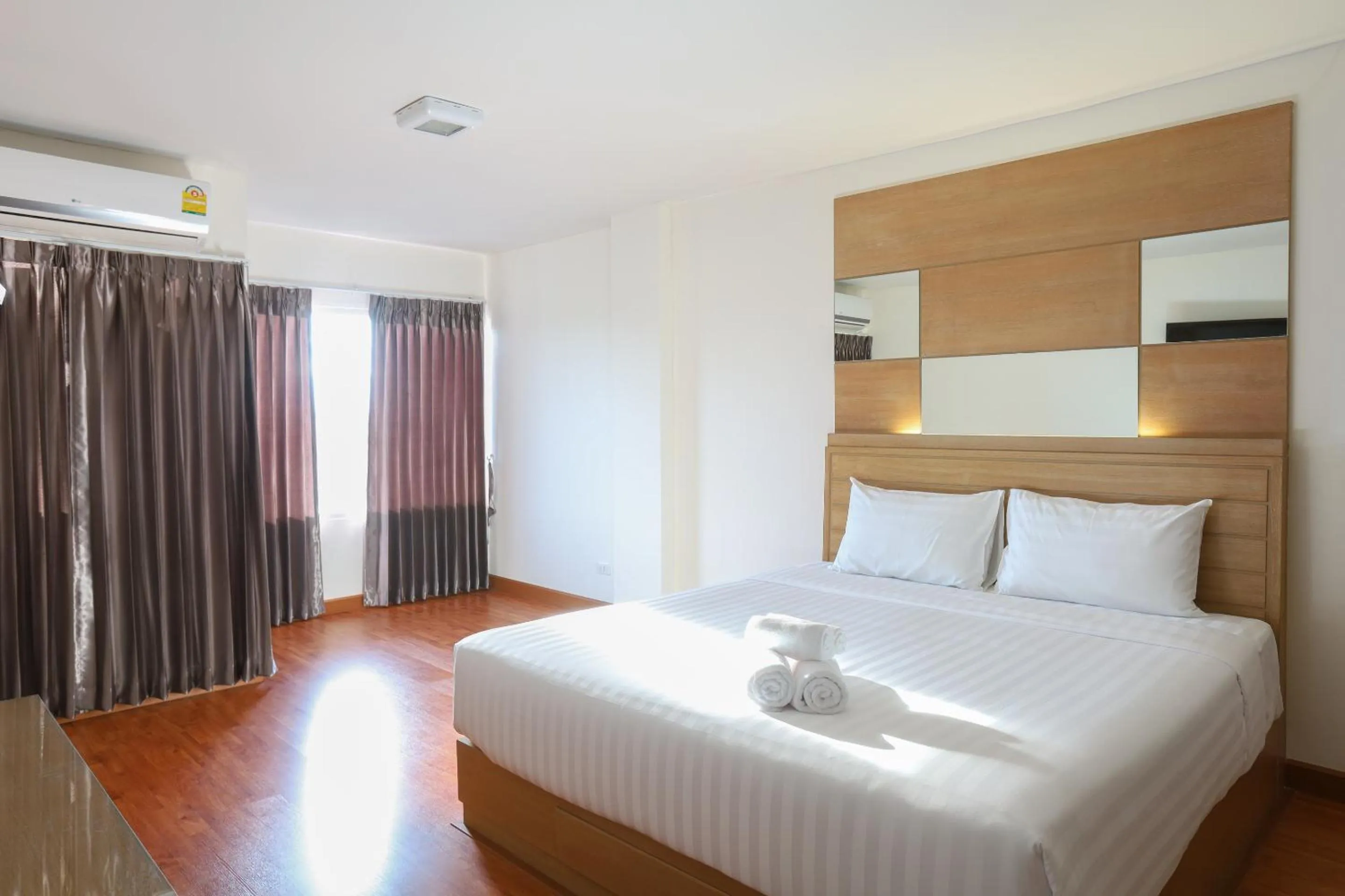 Bed in The Greenery central suite & hotel