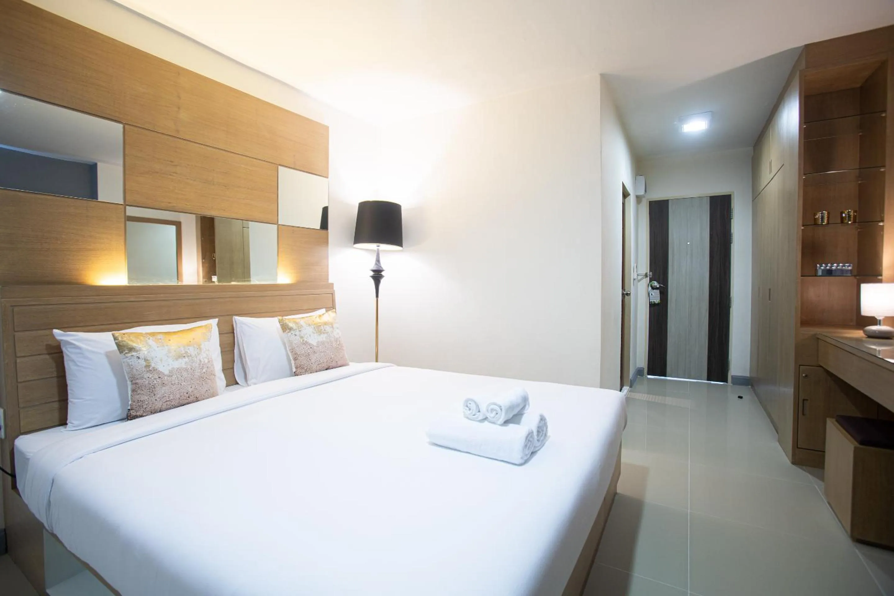 Bed in The Greenery central suite & hotel