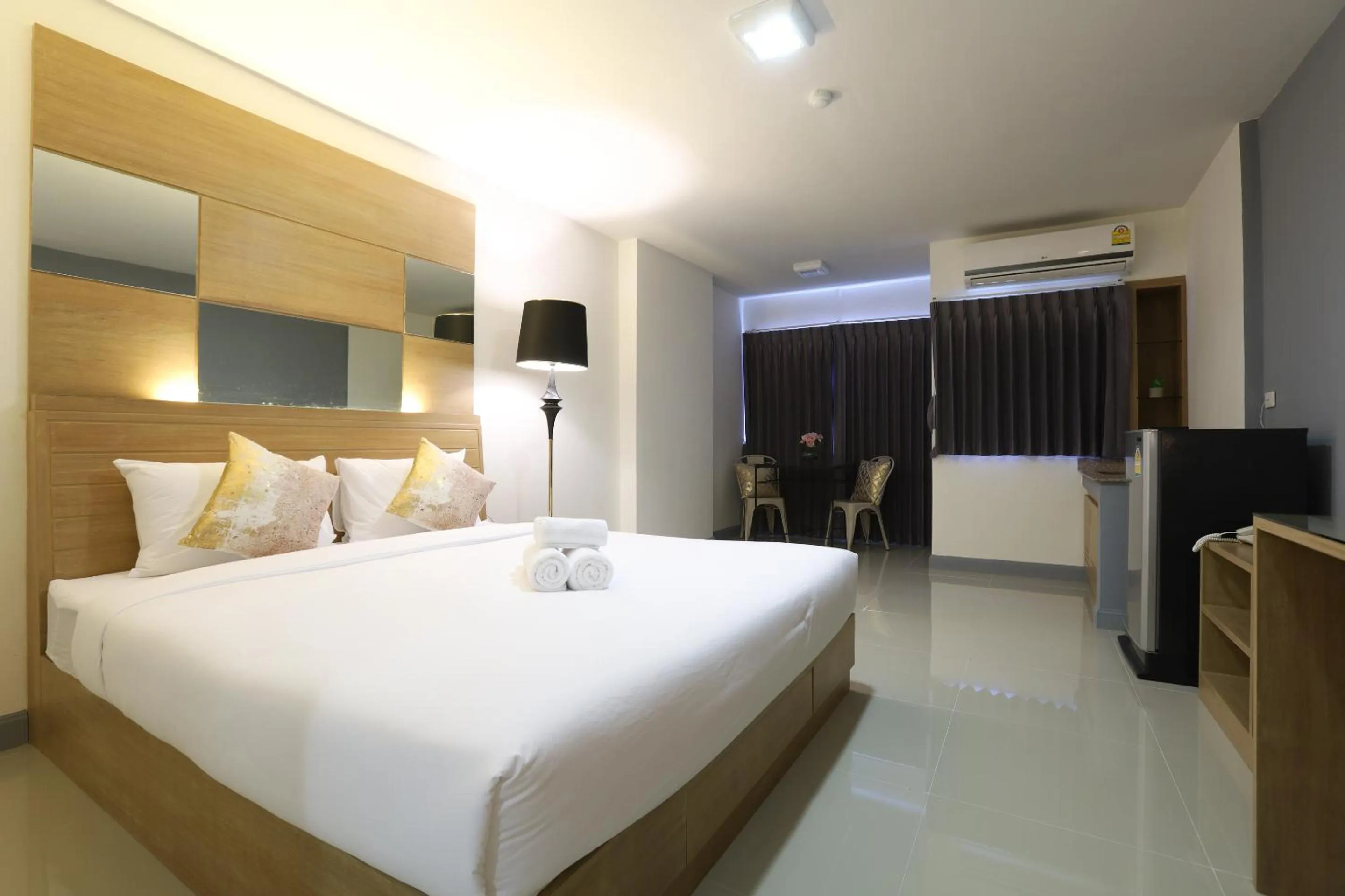 Photo of the whole room, Bed in The Greenery central suite & hotel