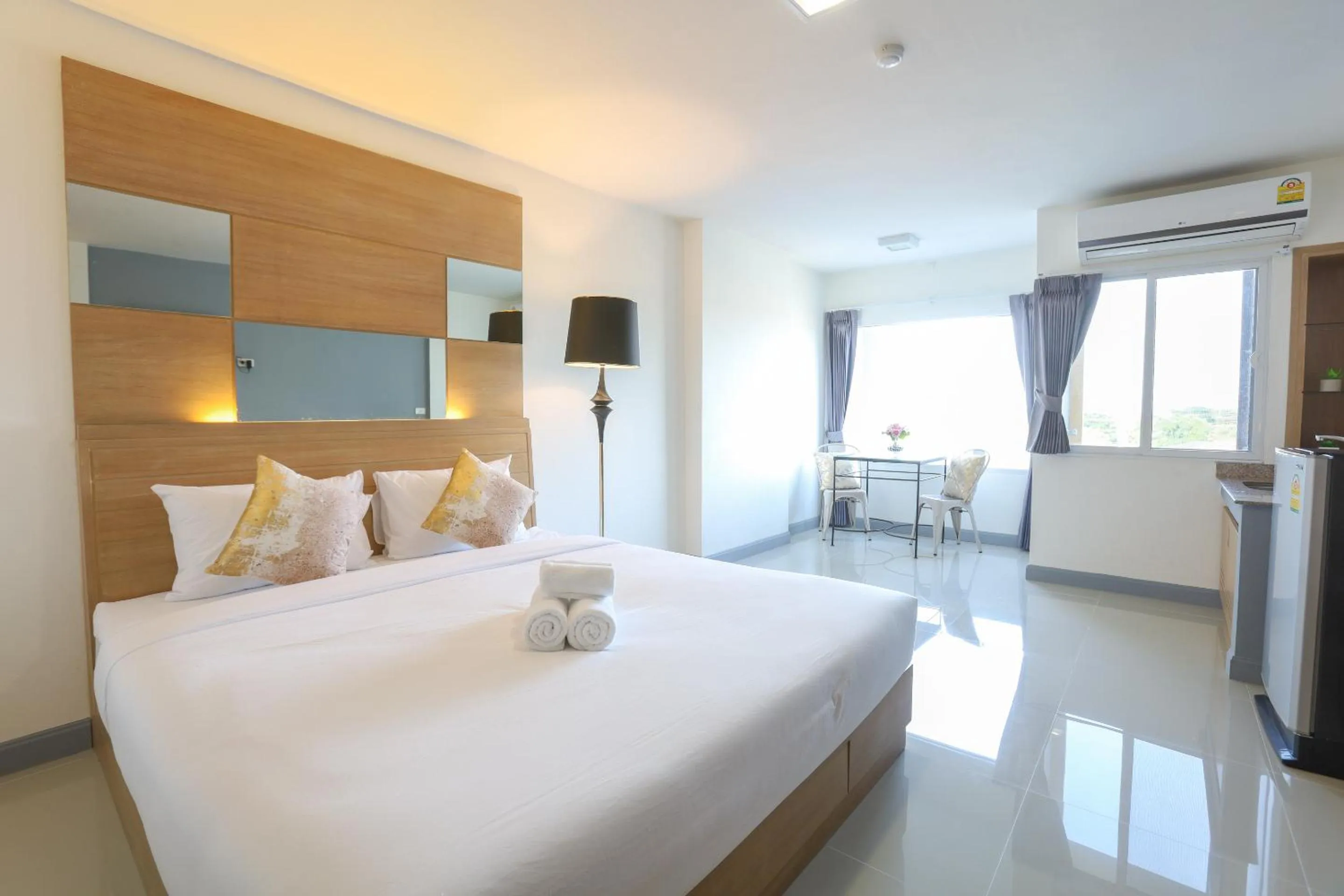 Photo of the whole room, Bed in The Greenery central suite & hotel