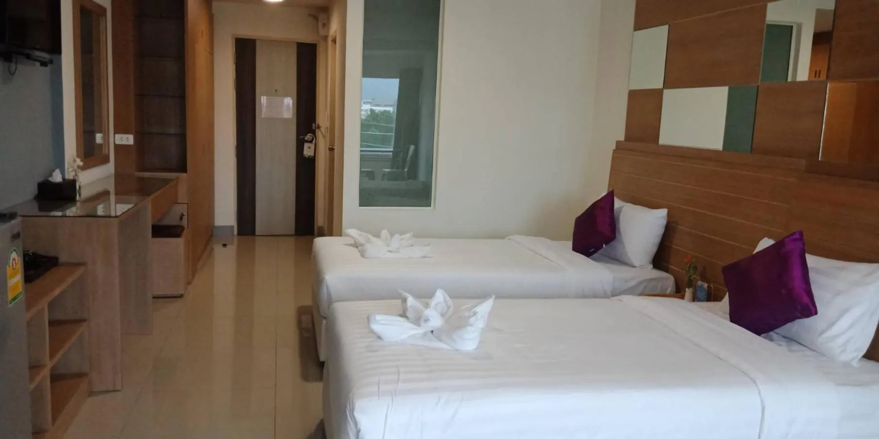 Bed in The Greenery central suite & hotel