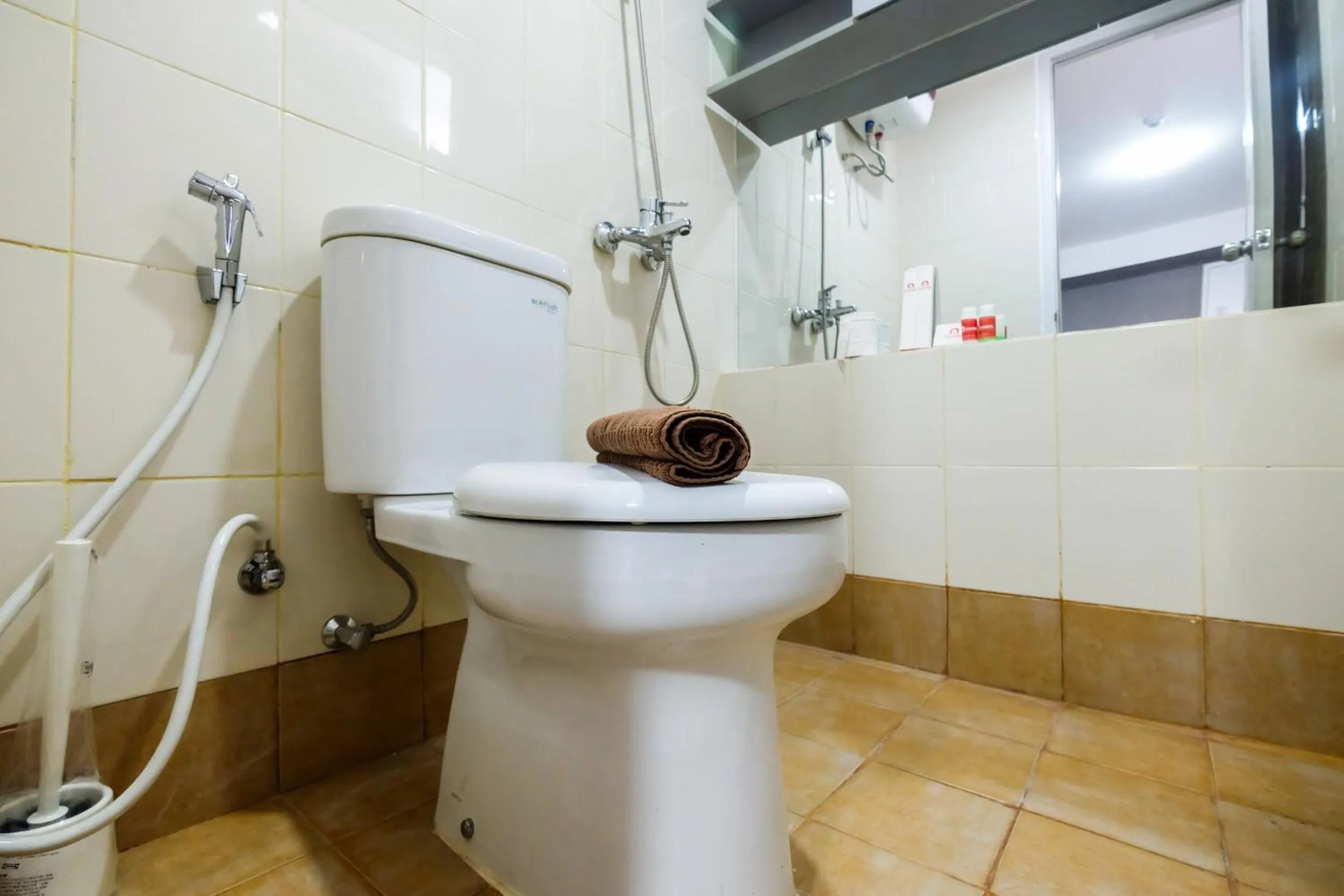 Bathroom in Modern and Comfort 2BR Bassura City Apartment By Travelio
