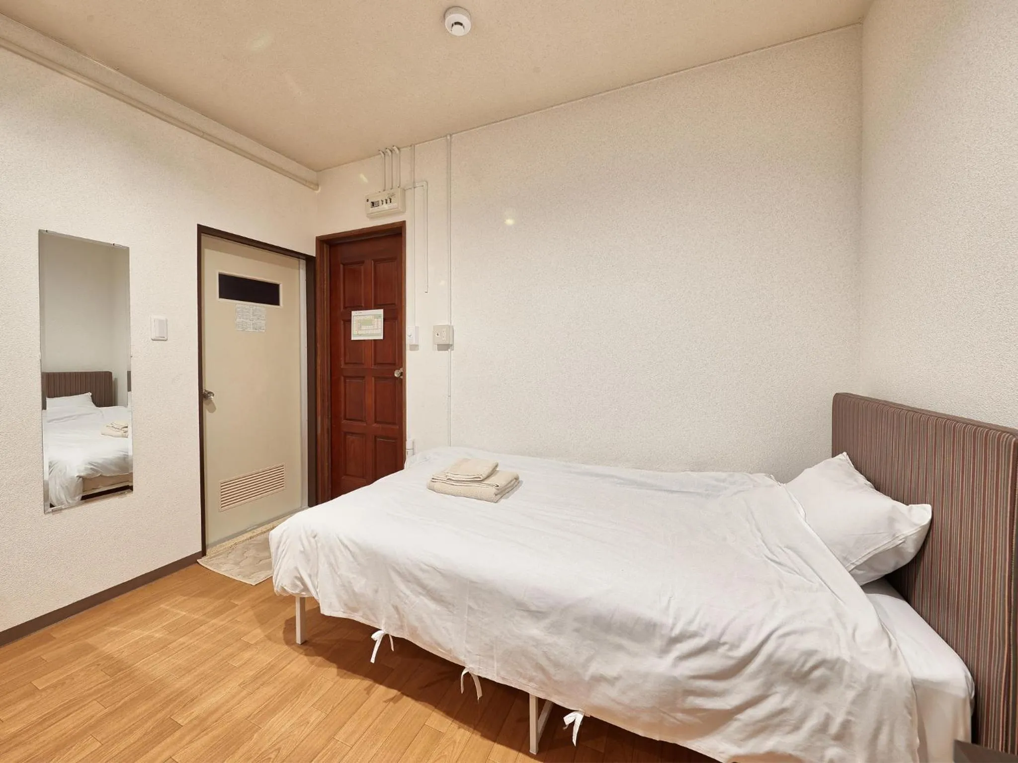 Bed in Okinawa City Hotel