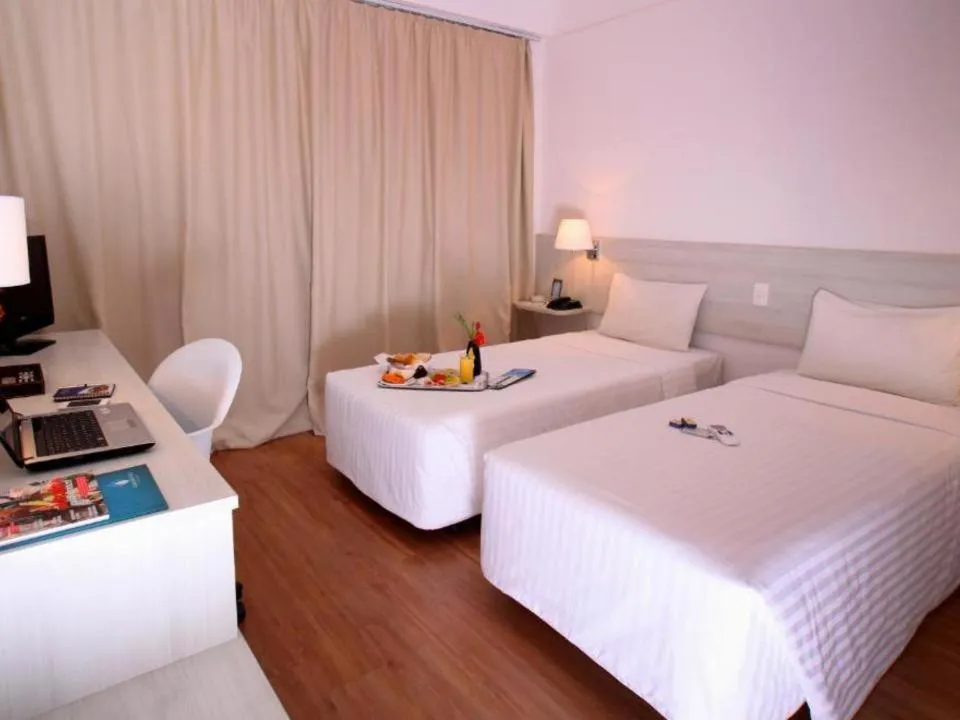 Bed in Camaçari Plaza Hotel