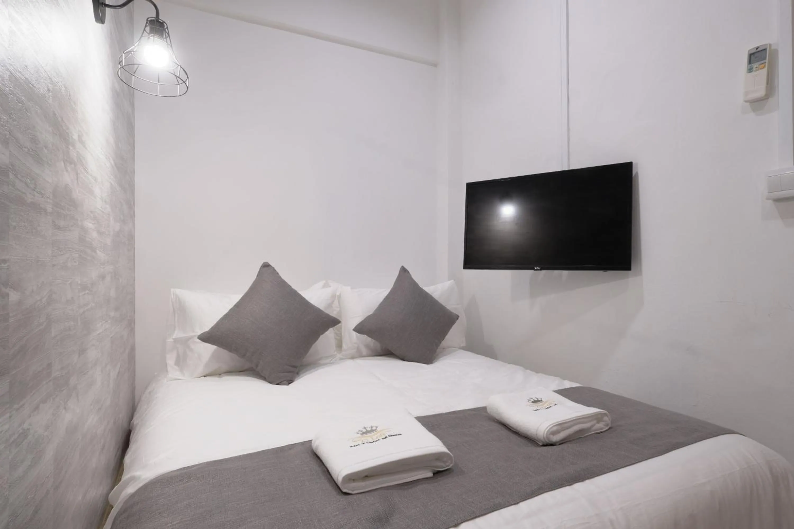 Bed in Q Loft Hotels at Bedok
