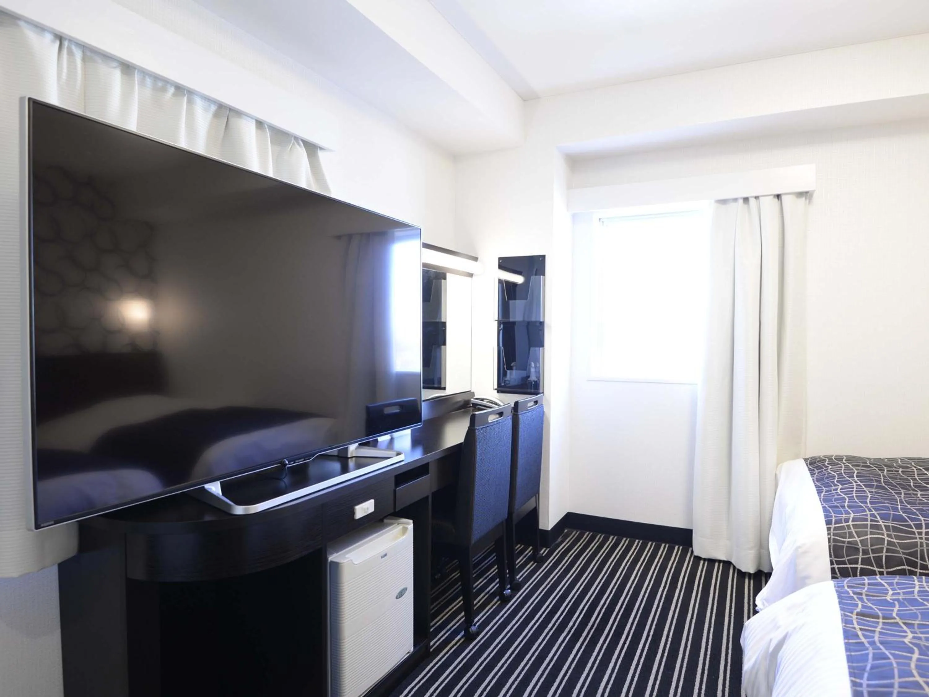 Photo of the whole room, Bed in APA Hotel Mito-eki Kita