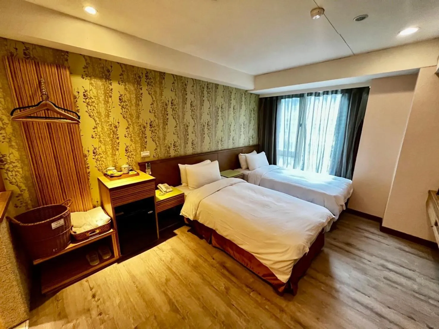 Bed in NAGAHIRO Hotel