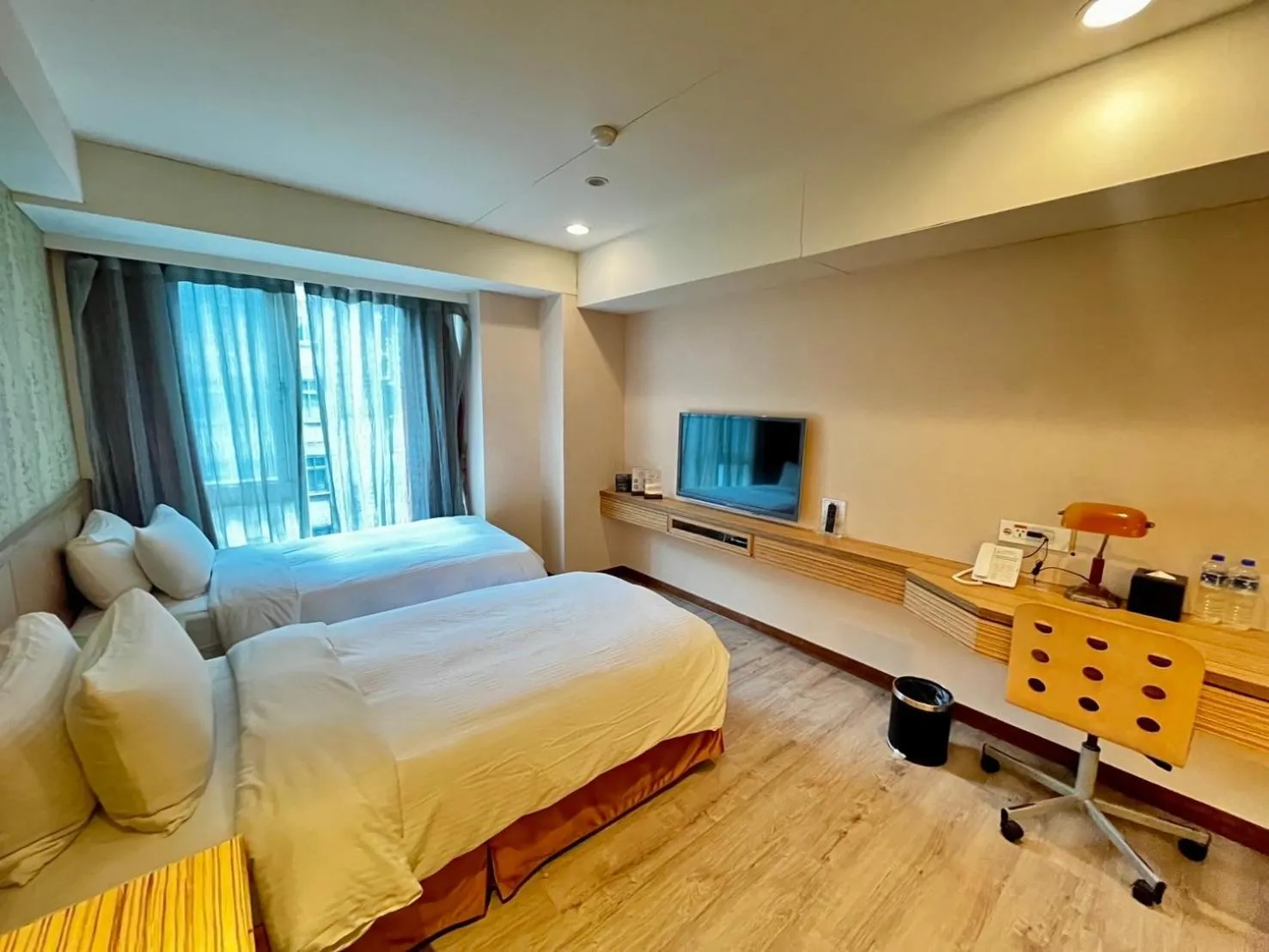 Bed in NAGAHIRO Hotel