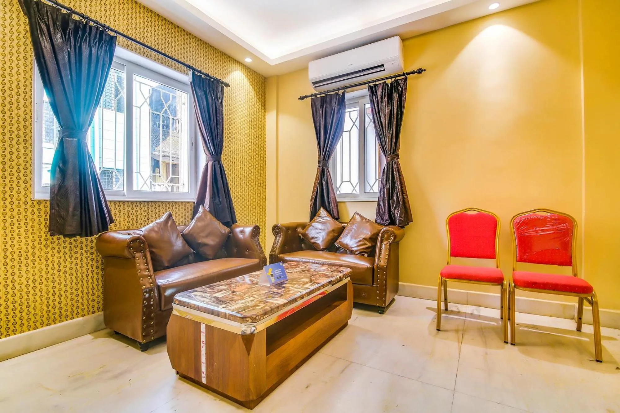 Seating area in FabHotel Luxor - Nr Acropolis Mall