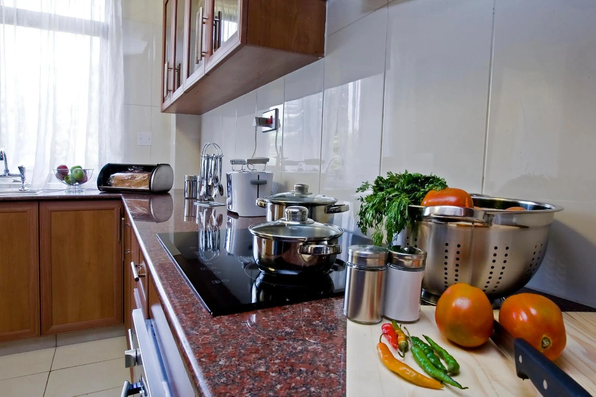Kitchen or kitchenette in GemSuites Serviced Apartments State House