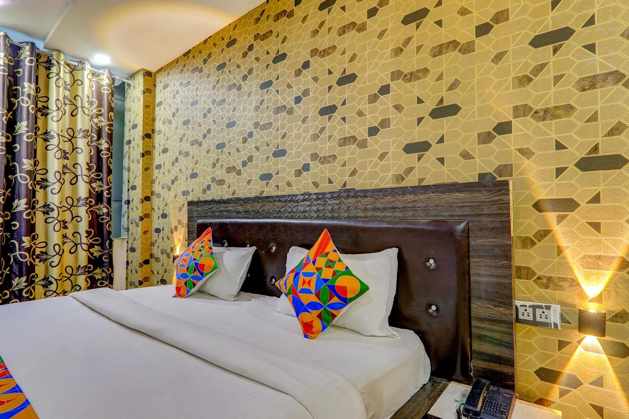 Bed in FabHotel Gold Galaxy