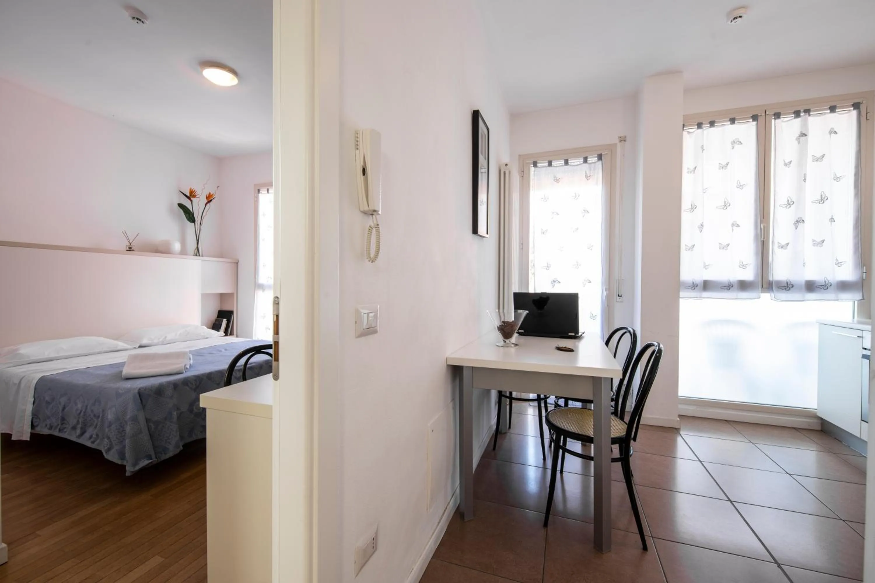 Bed in Amadei Hotel Figaro & Apartments