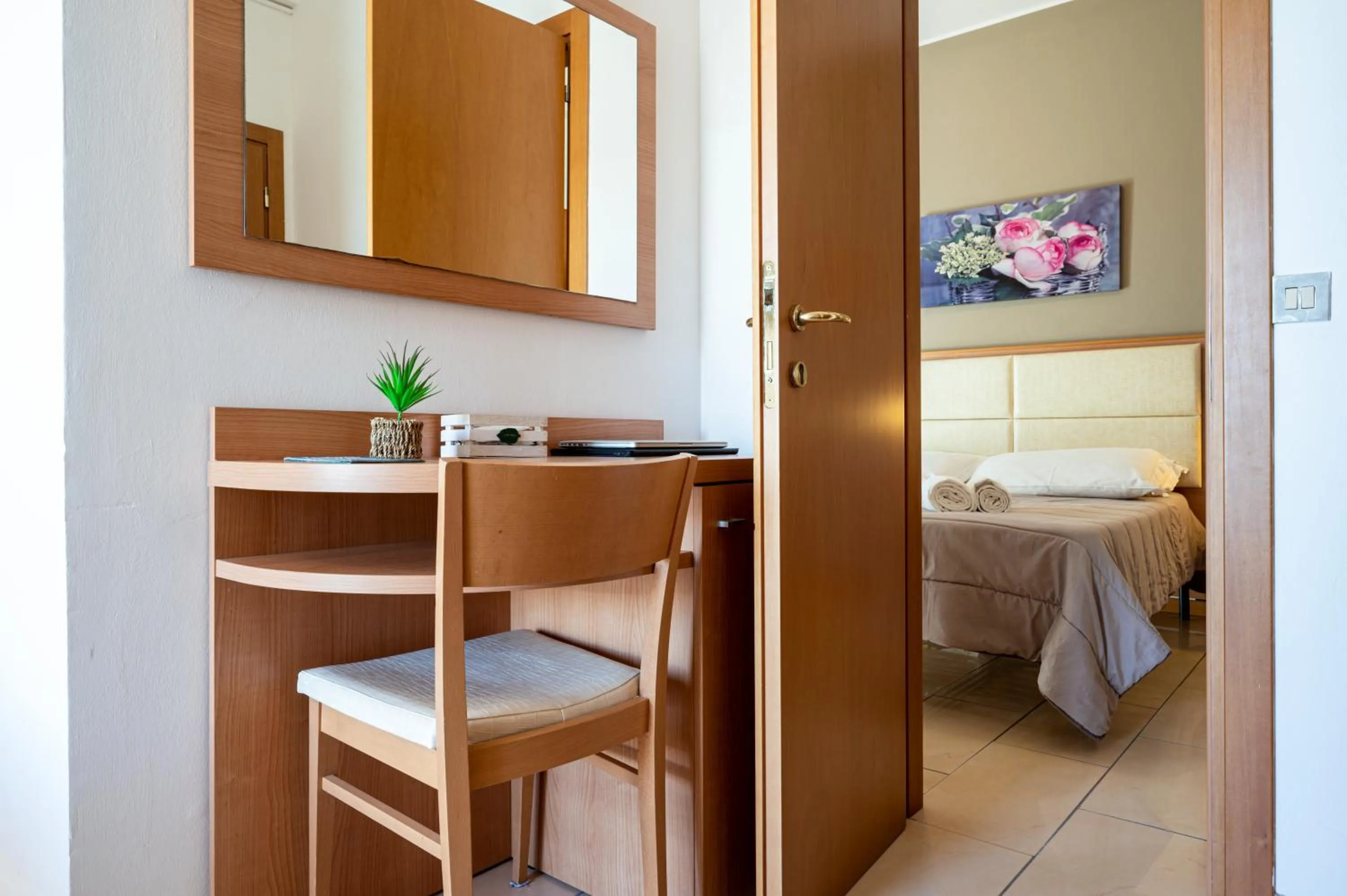 Bed in Amadei Hotel Figaro & Apartments