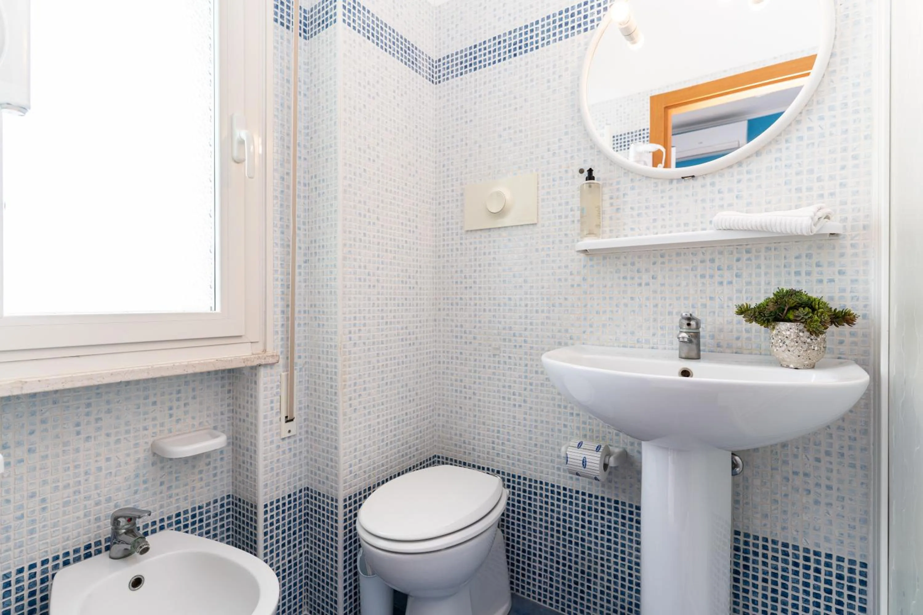 Bathroom in Amadei Hotel Figaro & Apartments