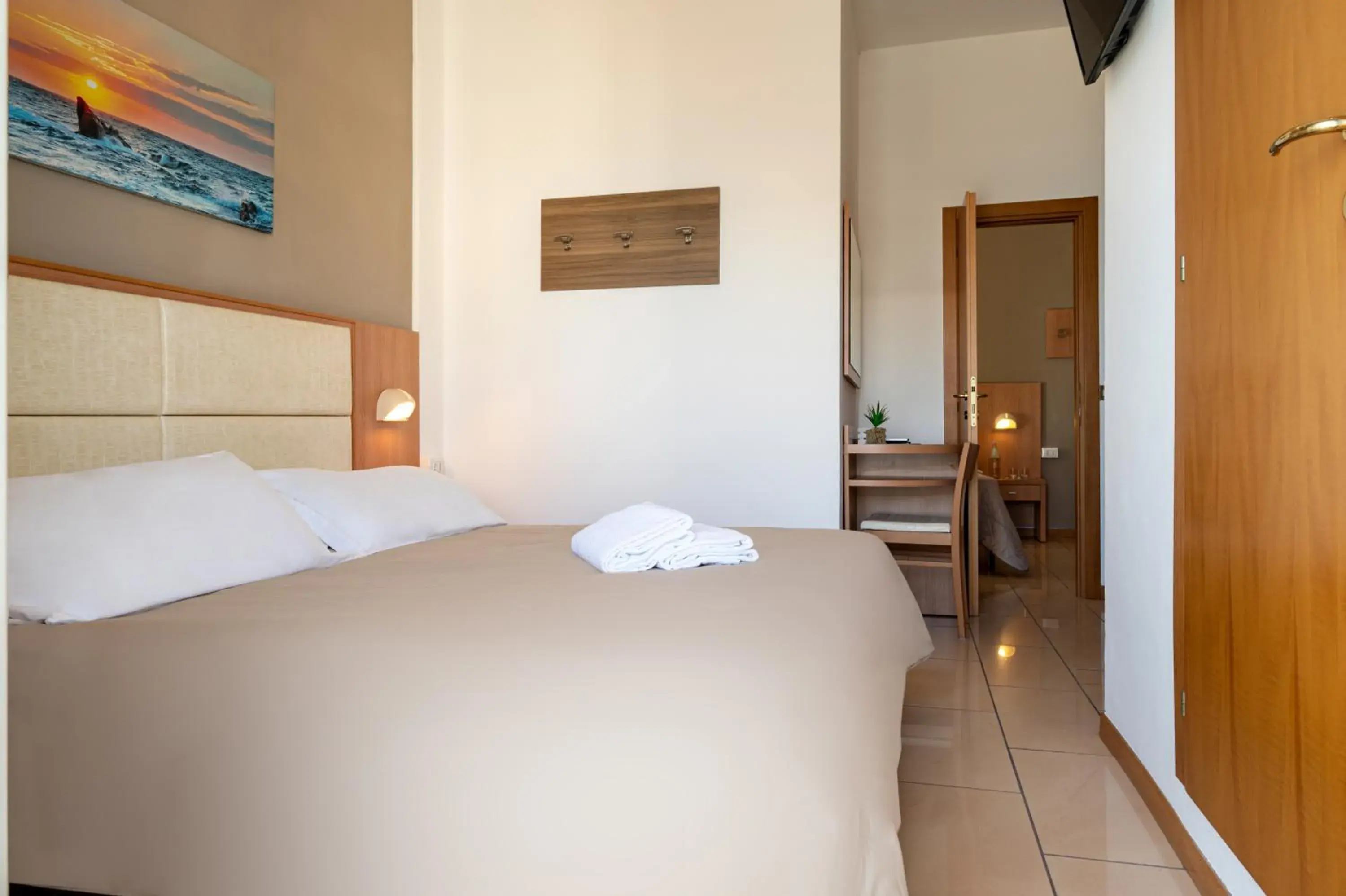 Deluxe Quadruple Room in Amadei Hotel Figaro & Apartments Deluxe Quadruple Room in Amadei Hotel Figaro & Apartments