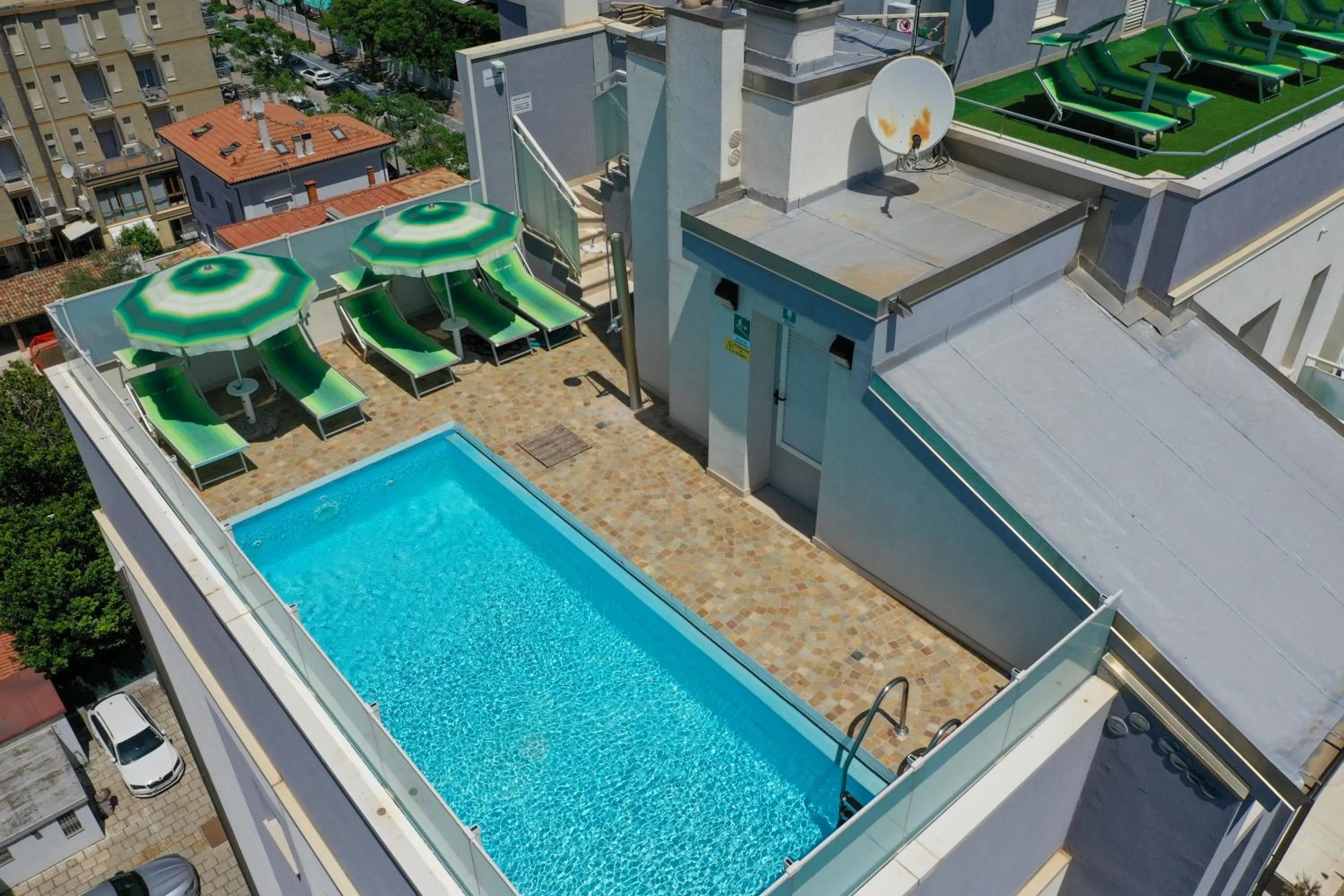 Swimming pool in Amadei Hotel Figaro & Apartments