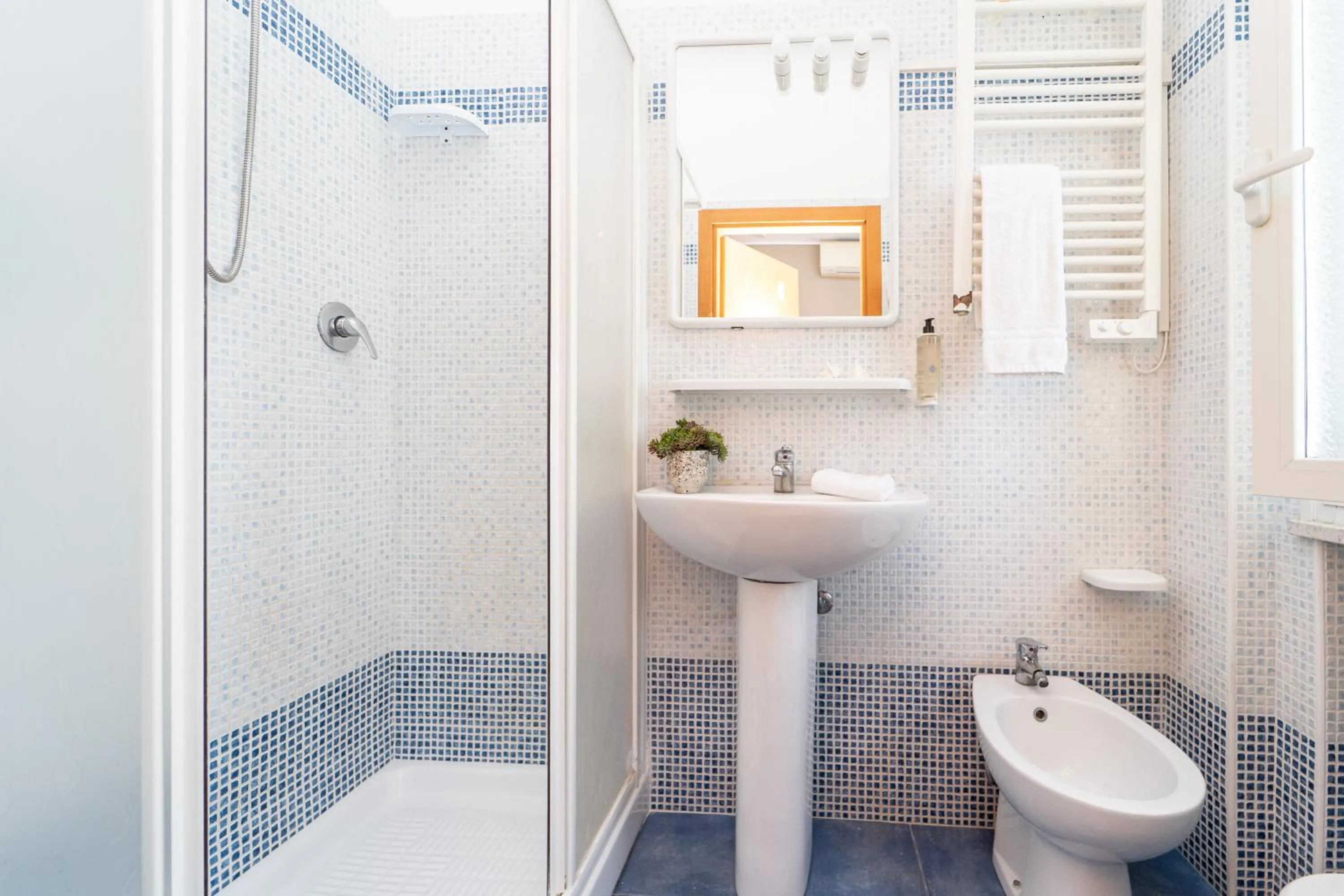 Bathroom in Amadei Hotel Figaro & Apartments