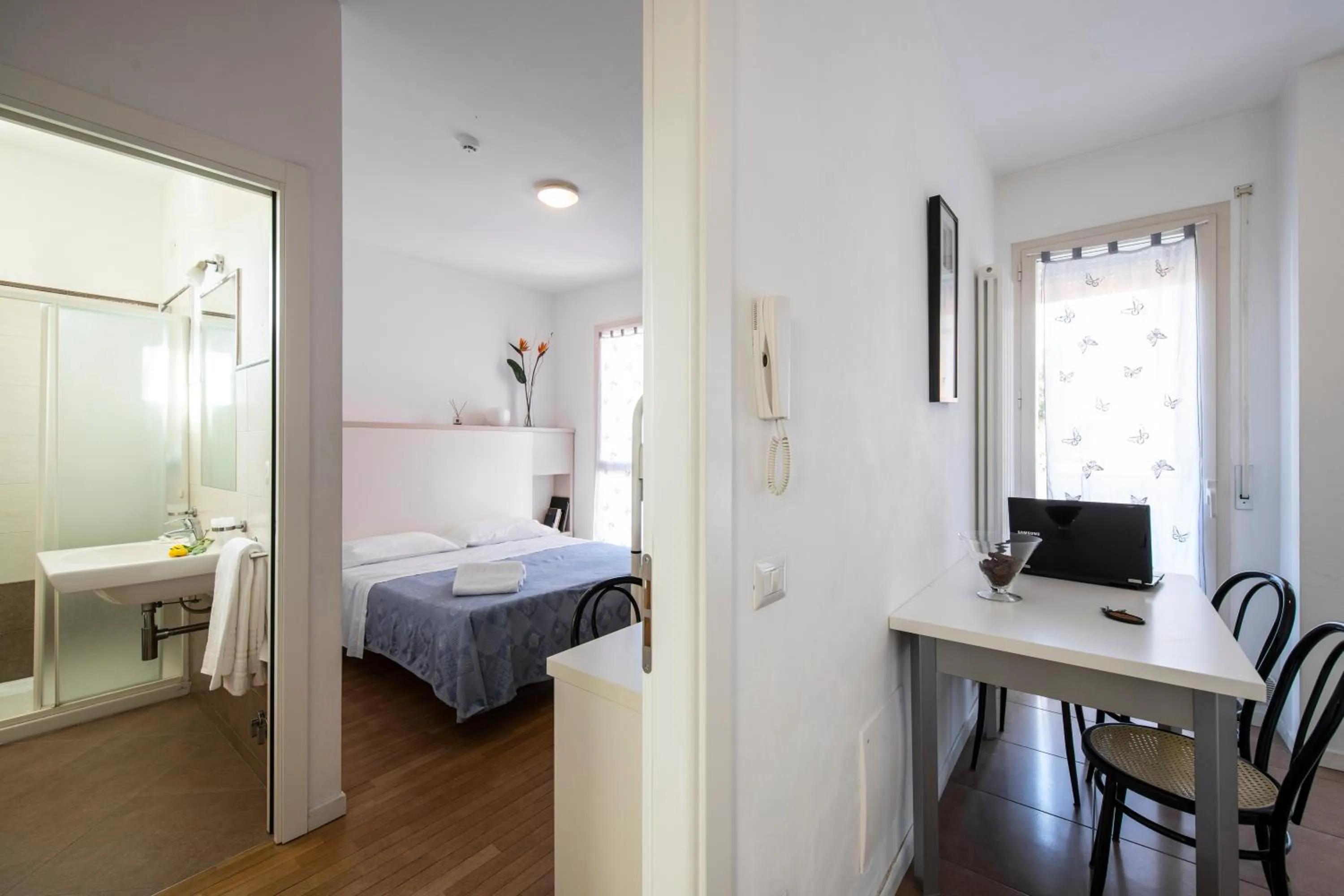 Bed in Amadei Hotel Figaro & Apartments