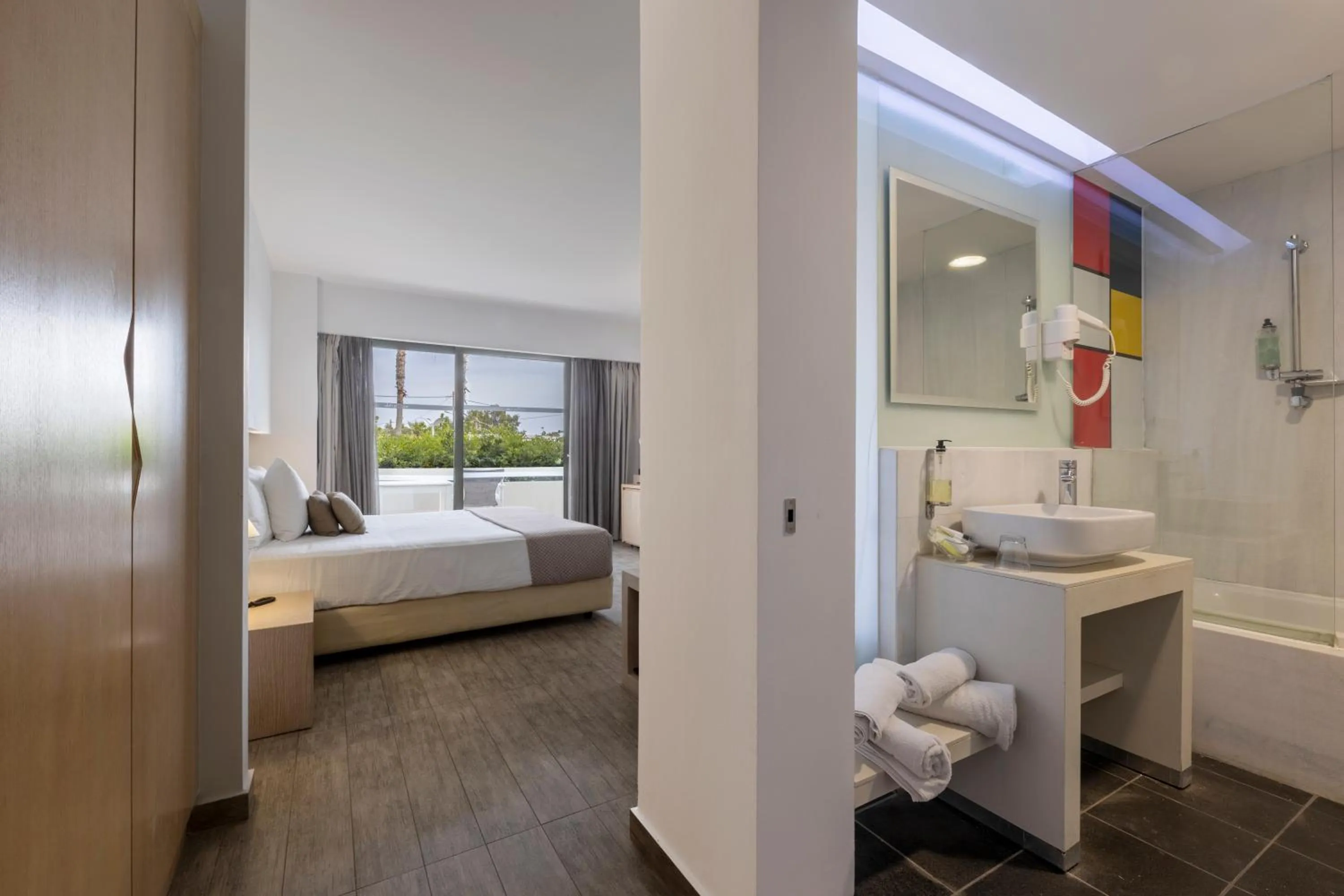 Garden view, Bed in Akti Palace Hotel