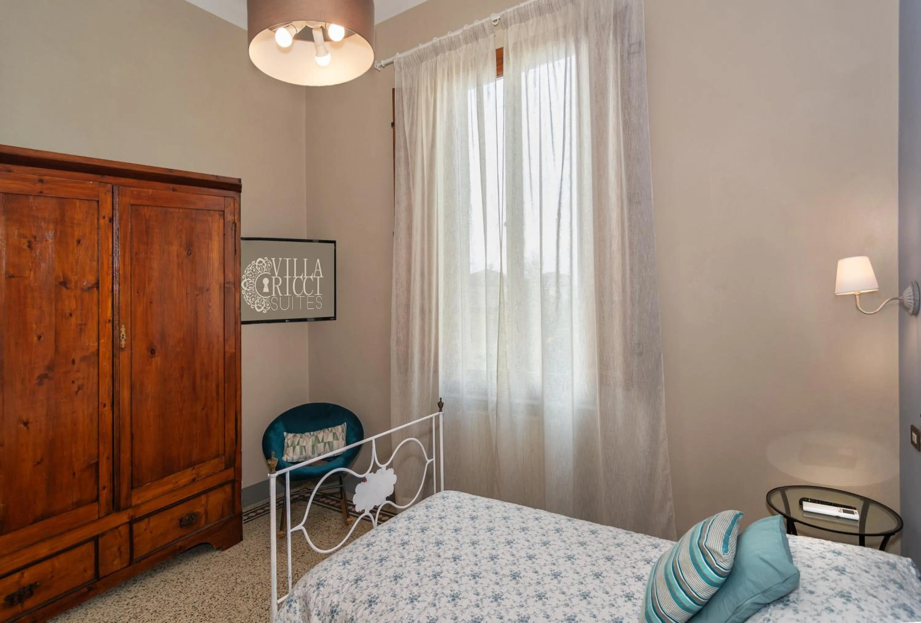 Bed in Villa Ricci Suites