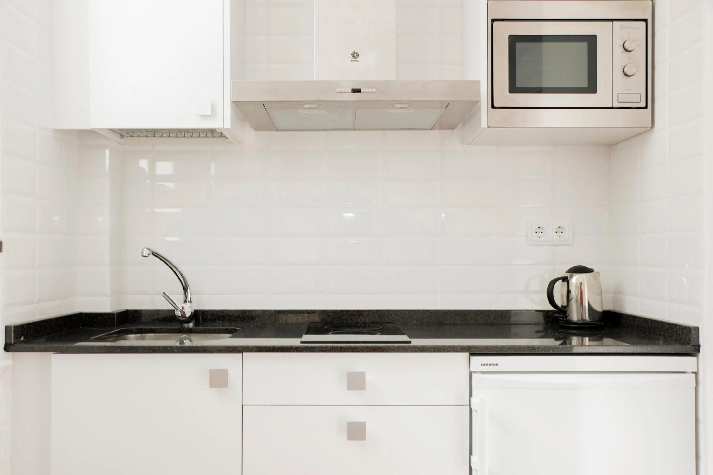 Kitchen or kitchenette in Apartamentos Sabinas El Pilar