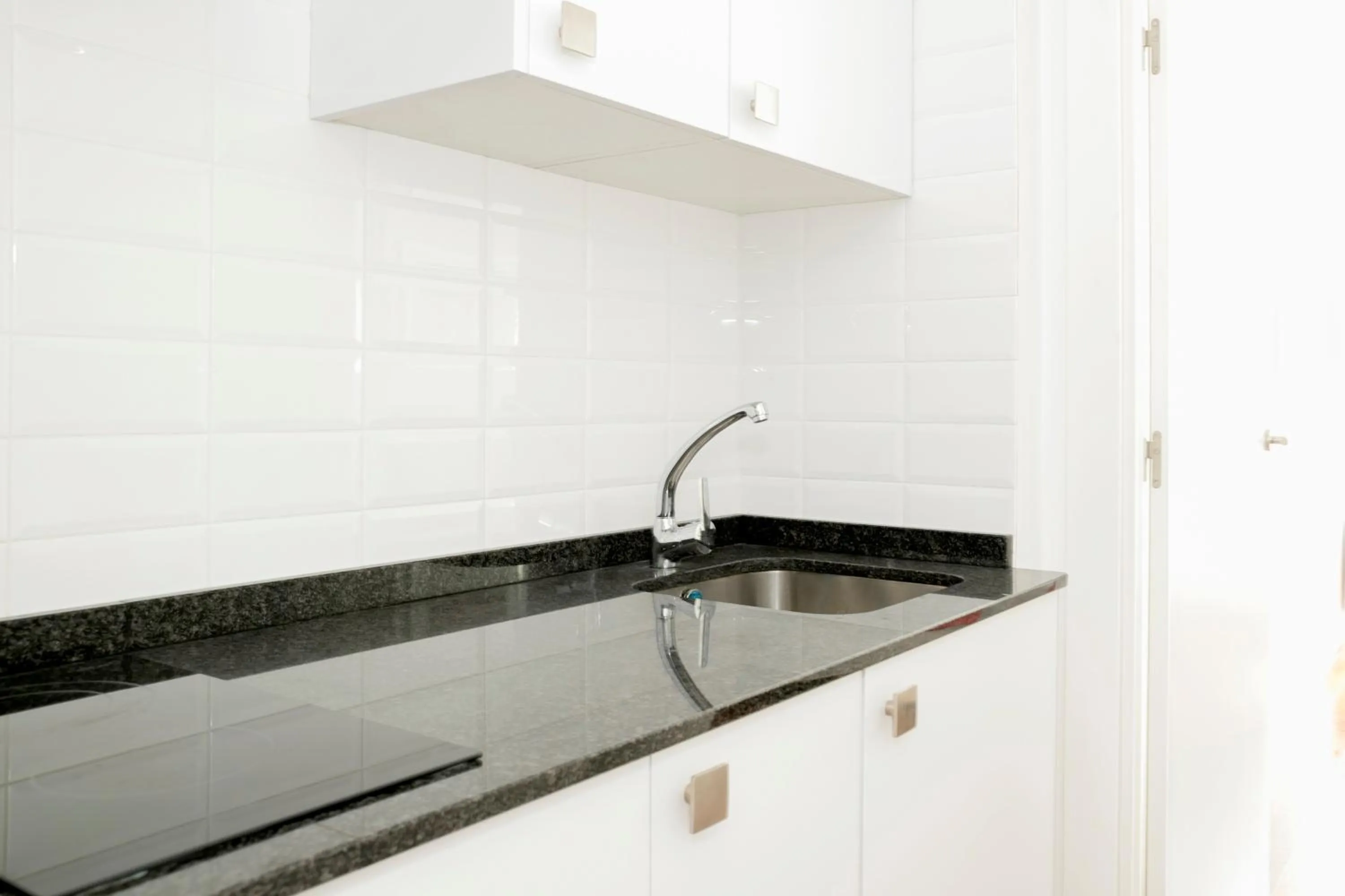 Kitchen or kitchenette in Apartamentos Sabinas El Pilar