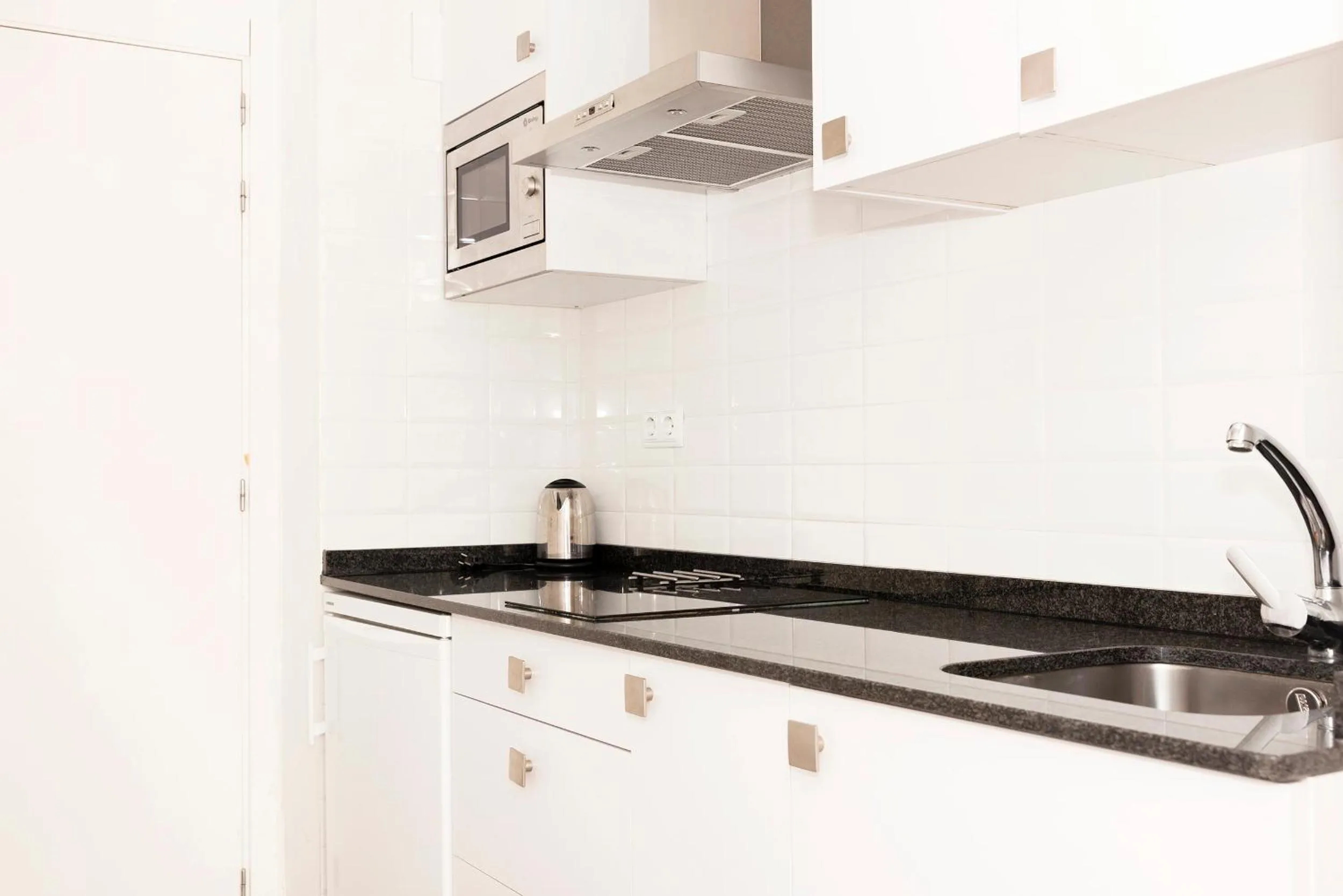 Kitchen or kitchenette in Apartamentos Sabinas El Pilar