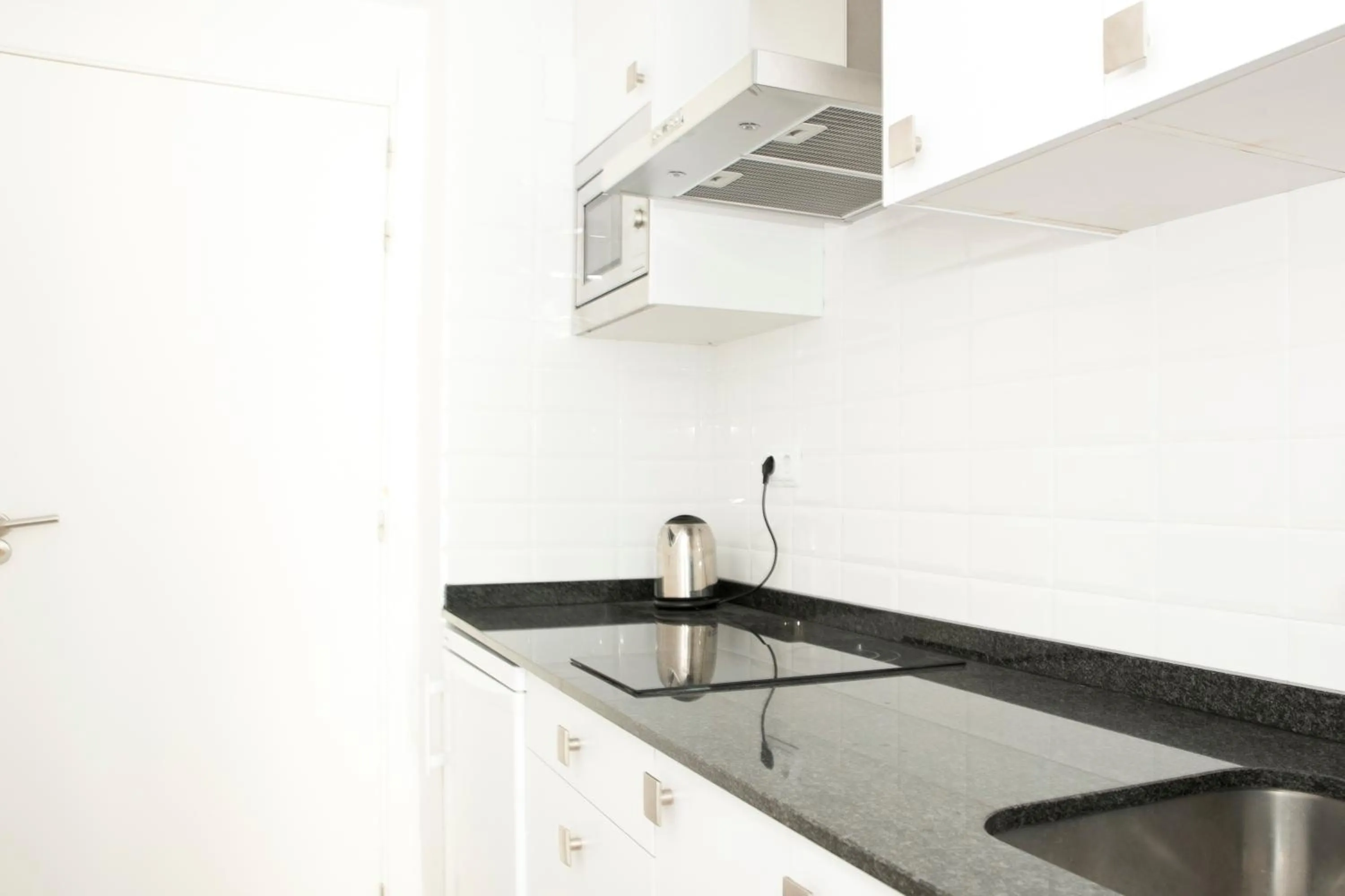 Kitchen or kitchenette in Apartamentos Sabinas El Pilar