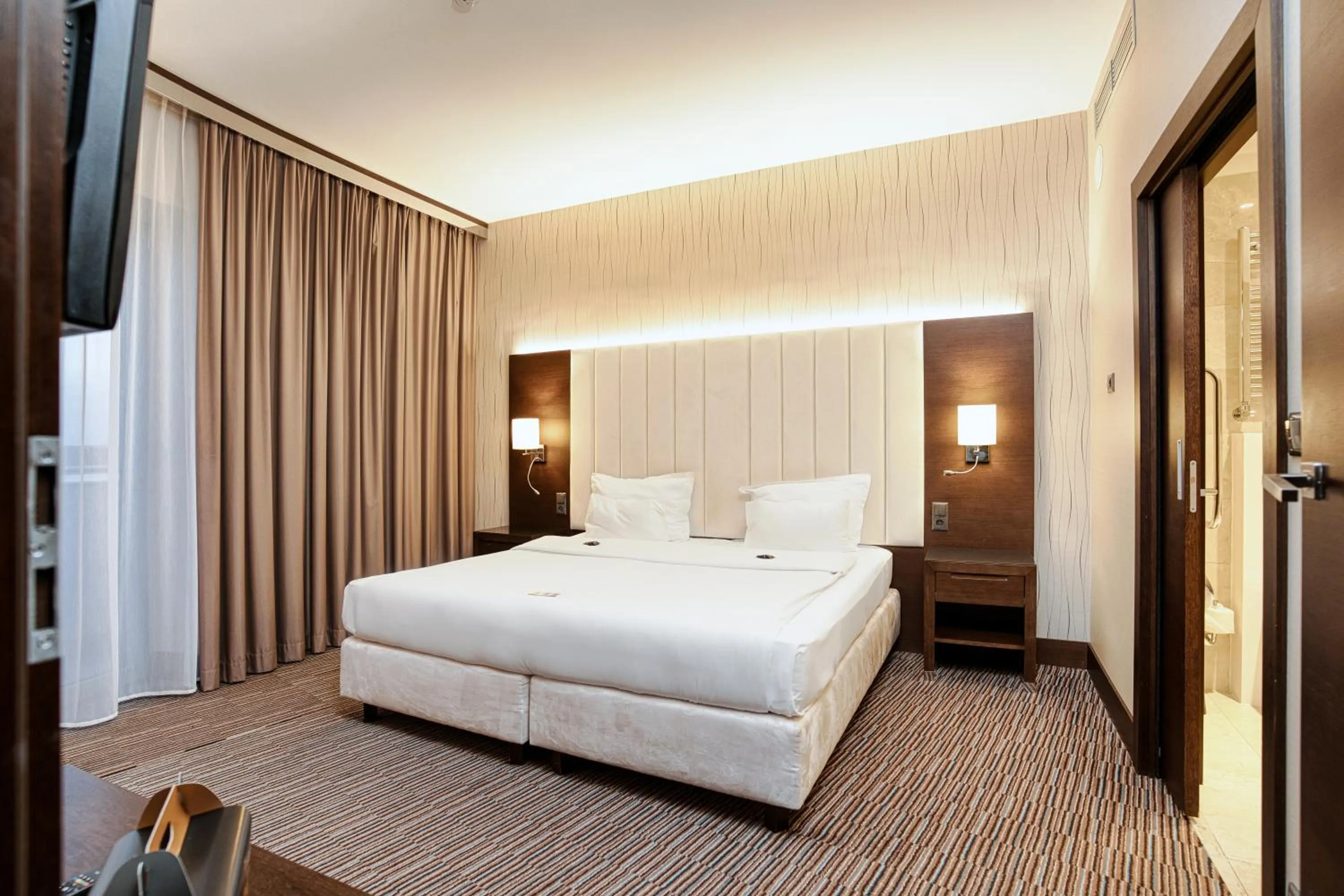 Bed in Copernicus Toruń Hotel