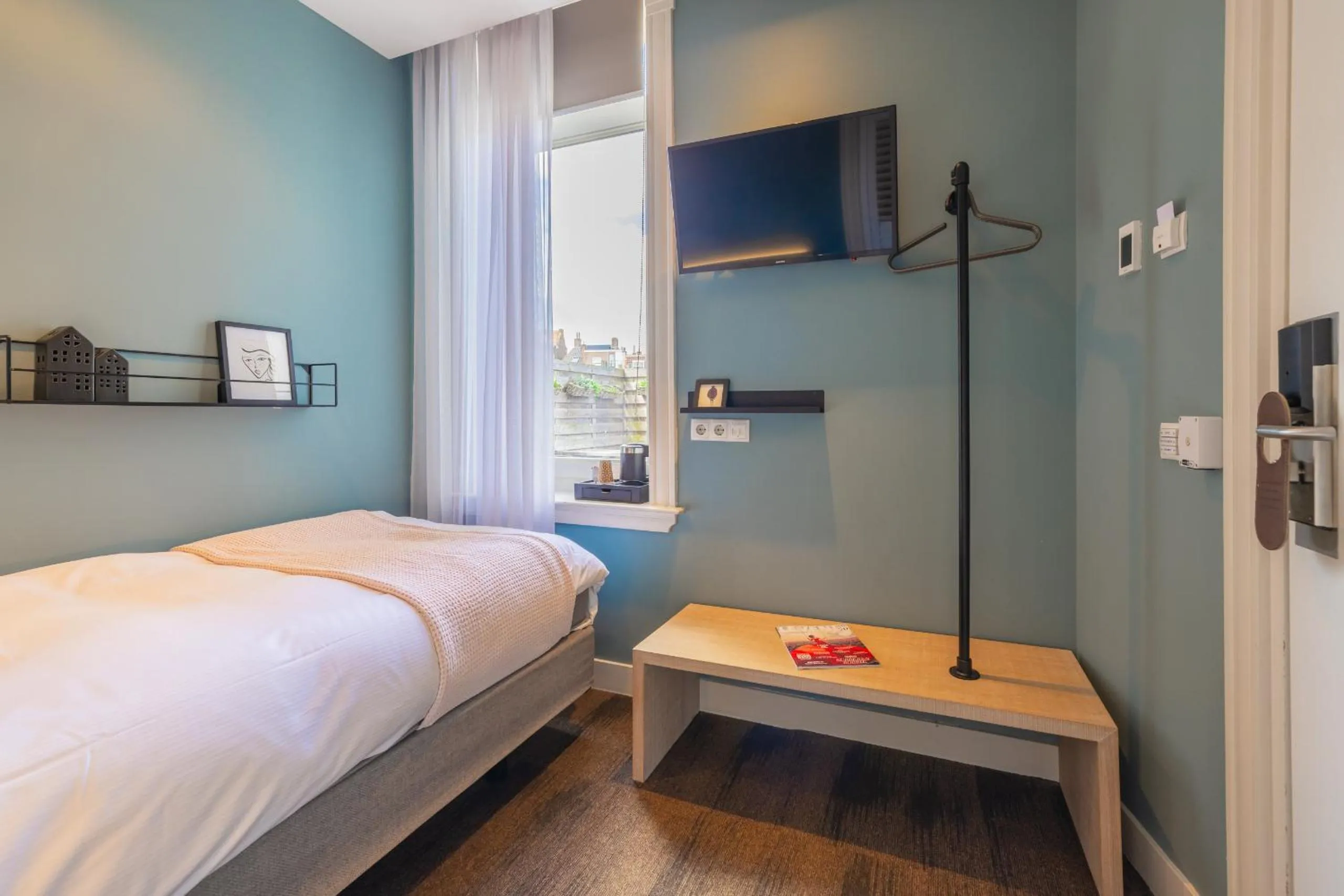 Bed in City Hotel Rembrandt