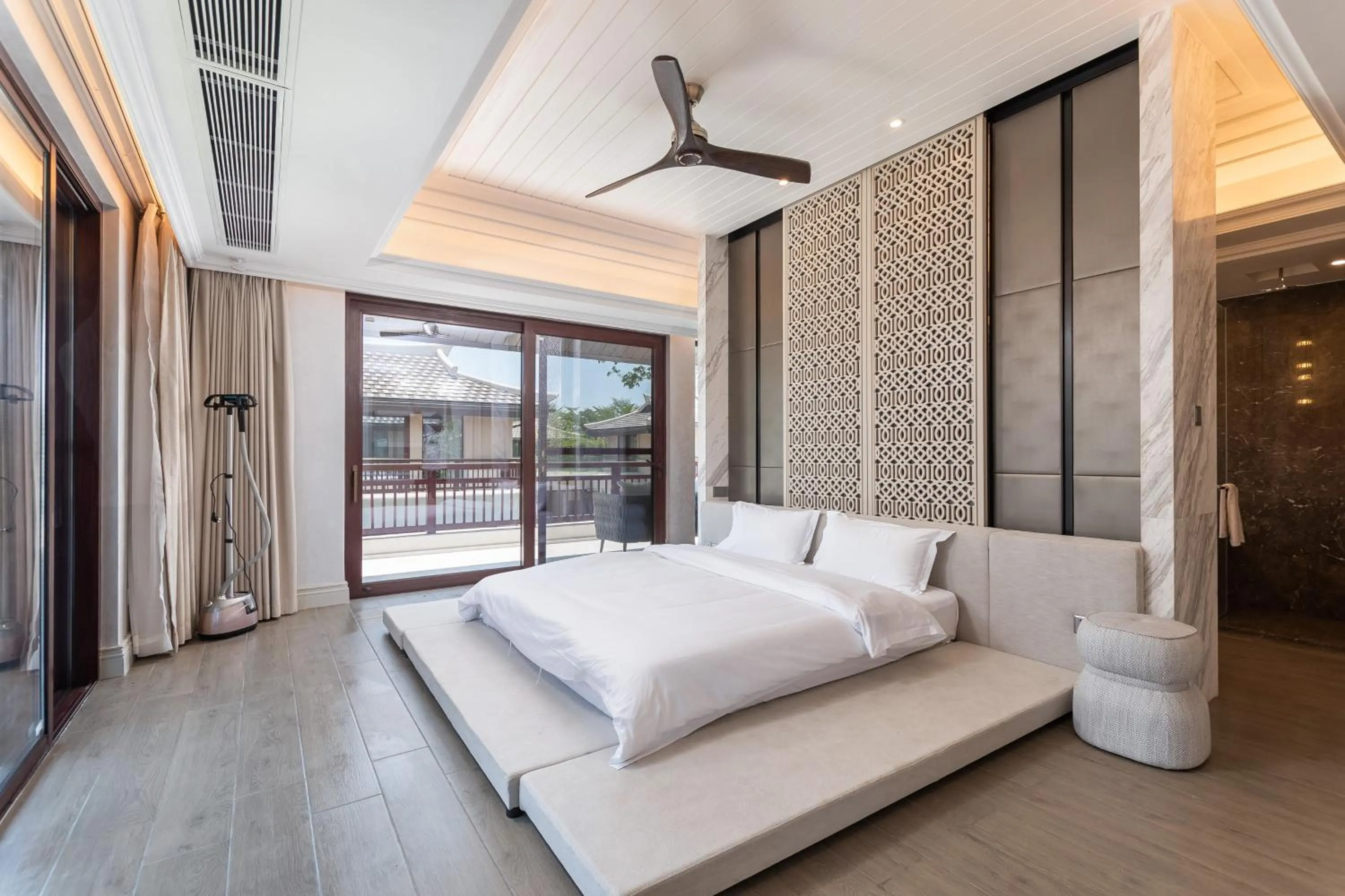 Bed in HaitangBay Loosen Coast Resort Villas