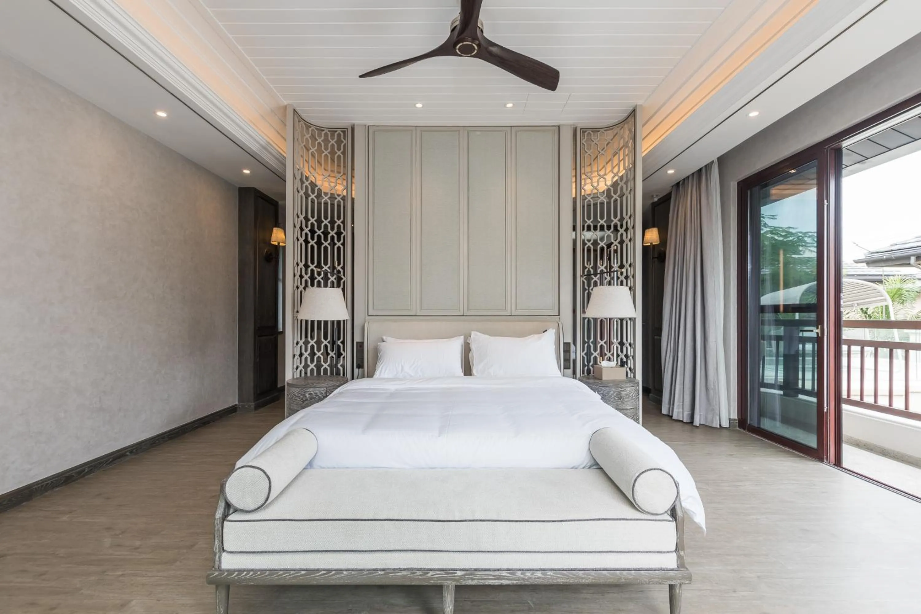 Bed in HaitangBay Loosen Coast Resort Villas