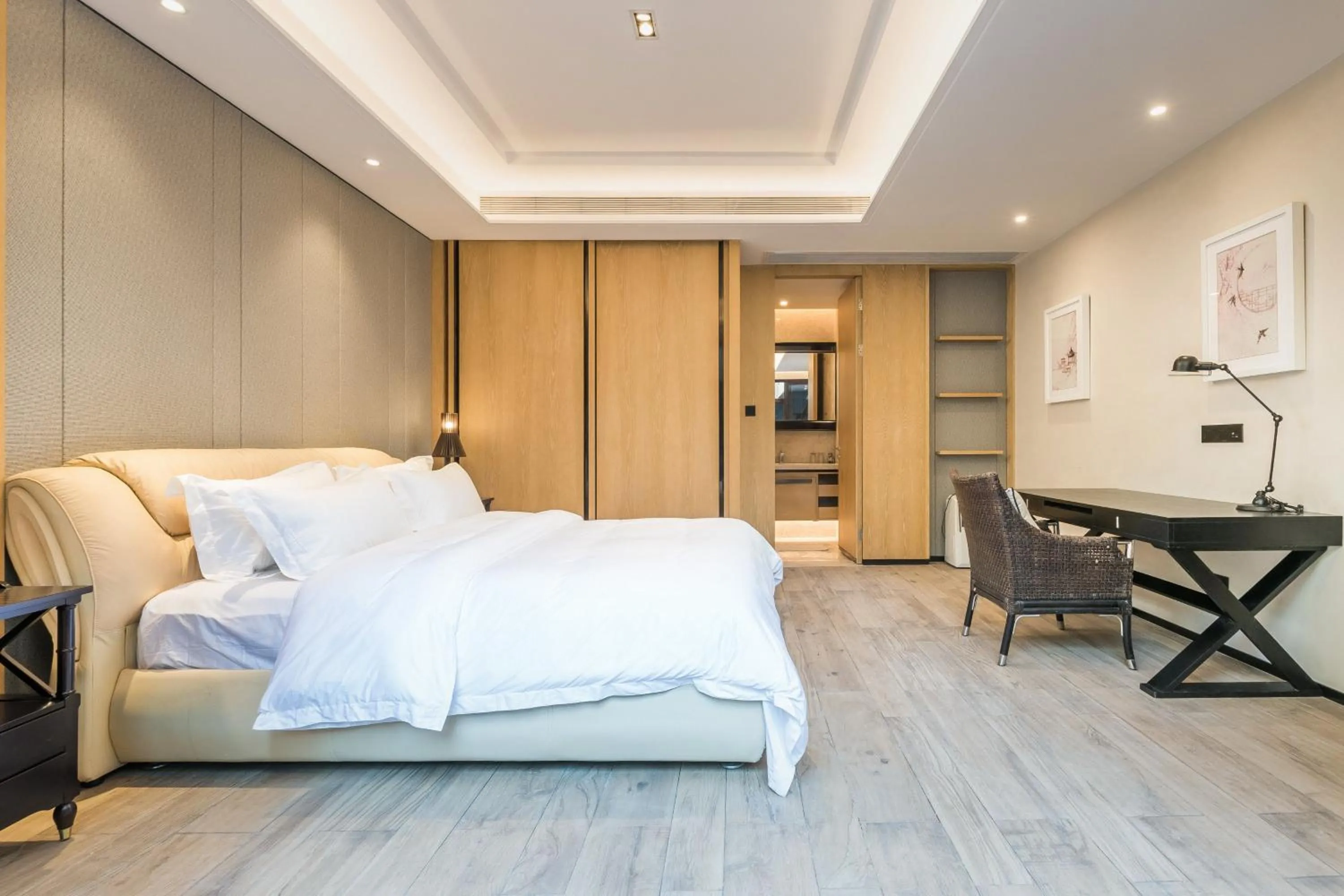 Bed in HaitangBay Loosen Coast Resort Villas