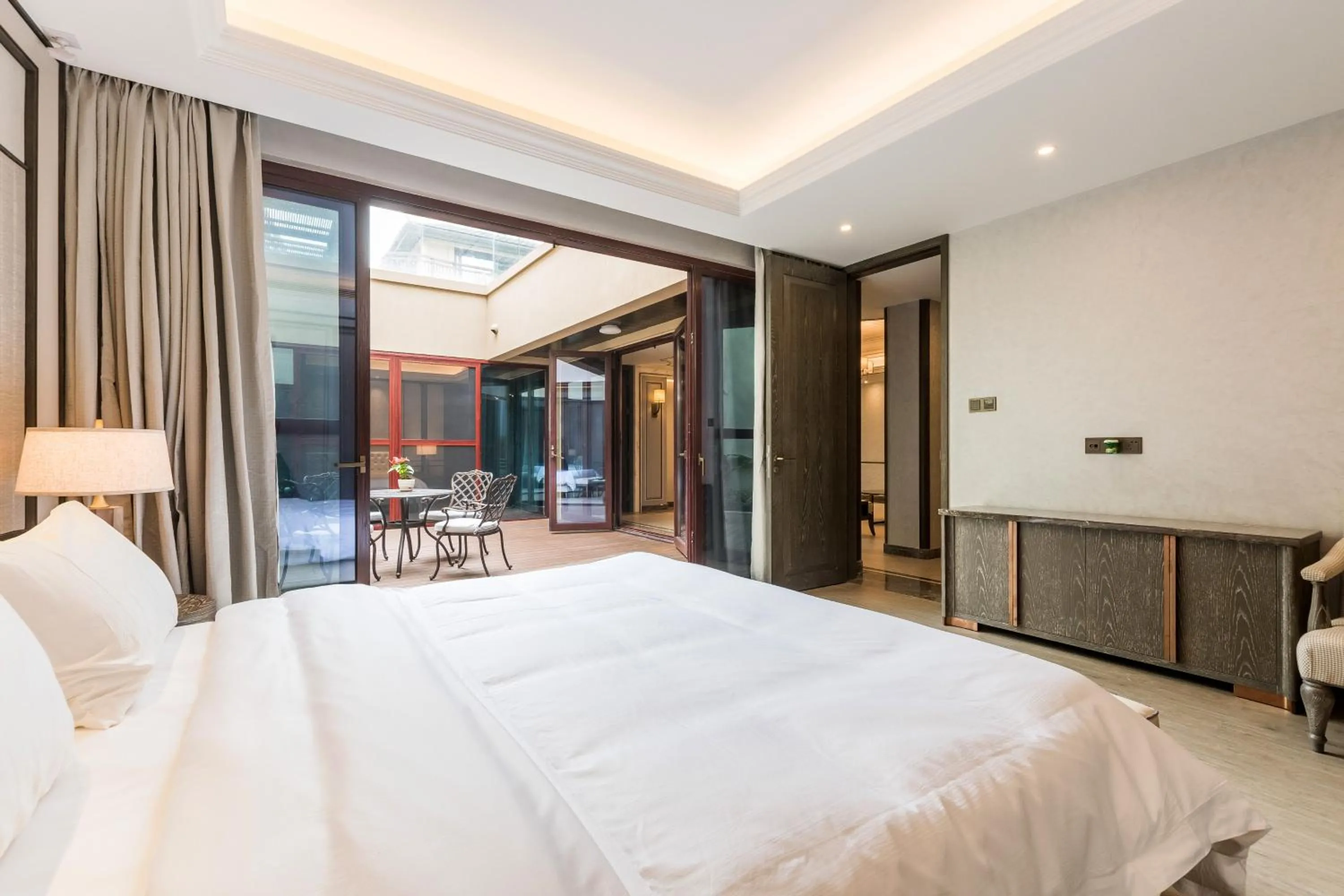 Bed in HaitangBay Loosen Coast Resort Villas