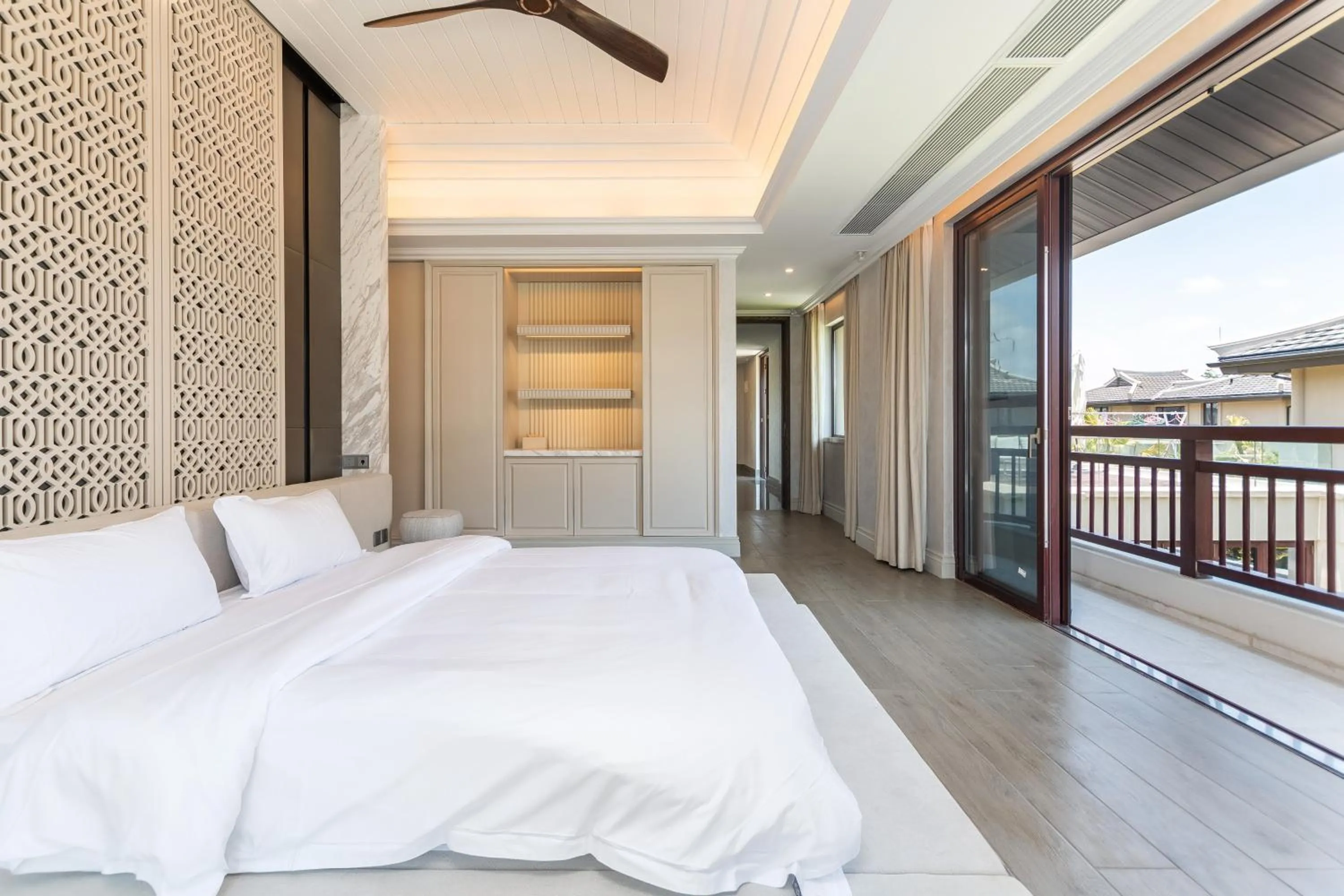 Bed in HaitangBay Loosen Coast Resort Villas