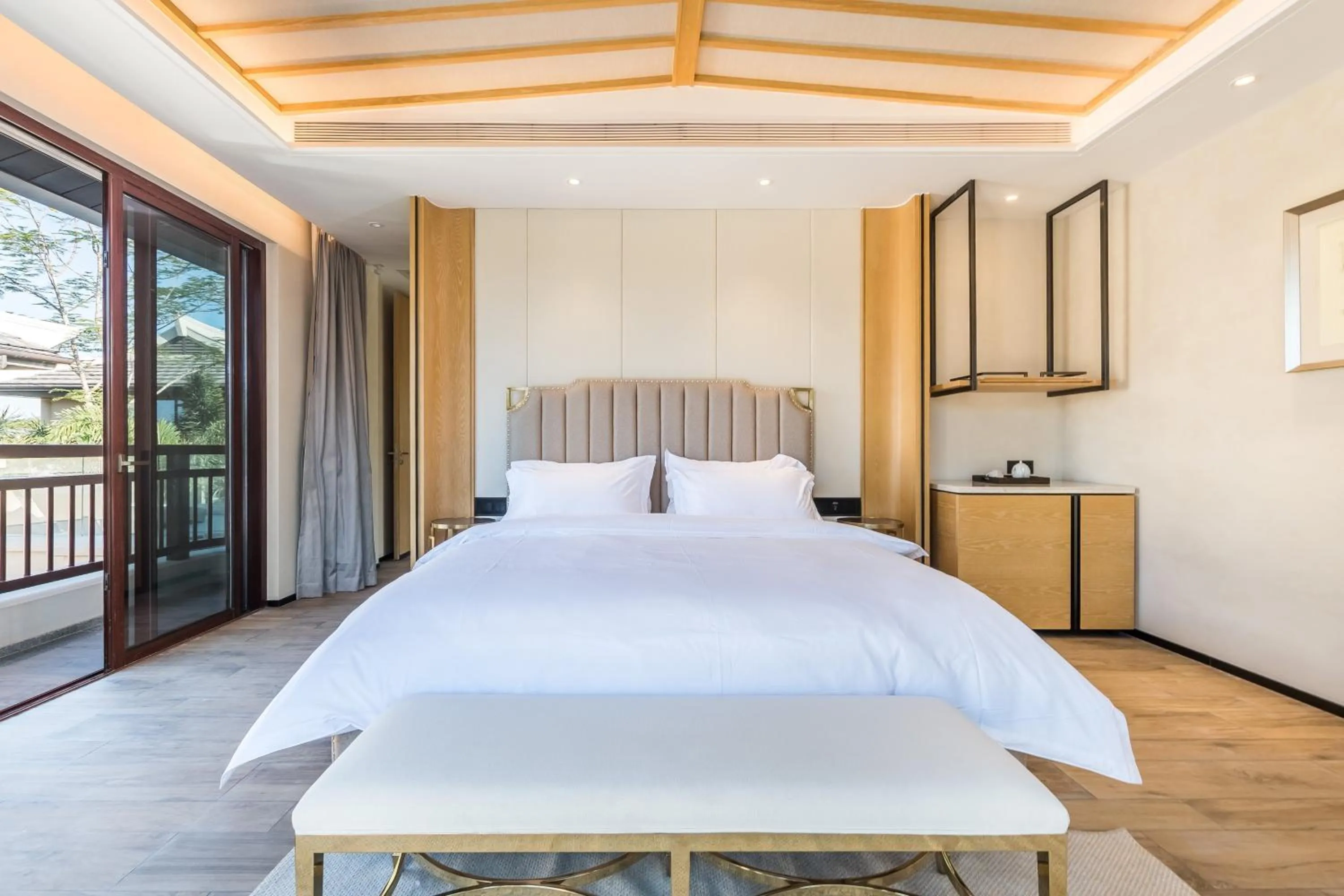 Bed in HaitangBay Loosen Coast Resort Villas